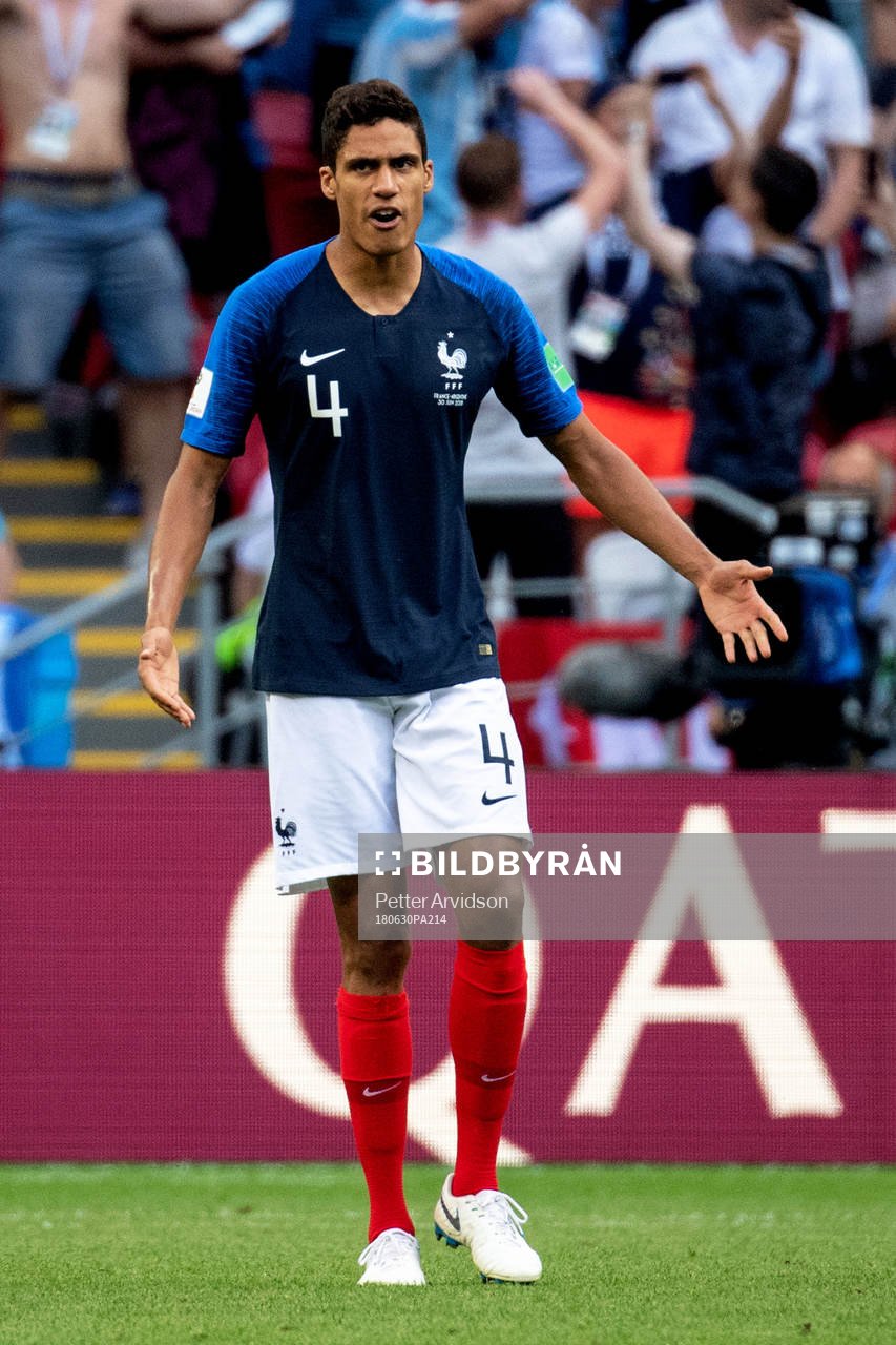 Raphael Varane of France looks dejected