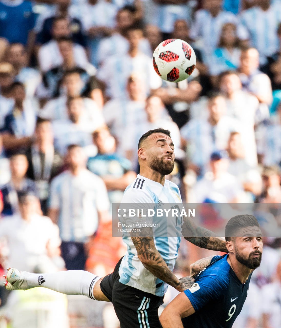 Nicolas Otamendi of Argentina and Olivier Giroud of France
