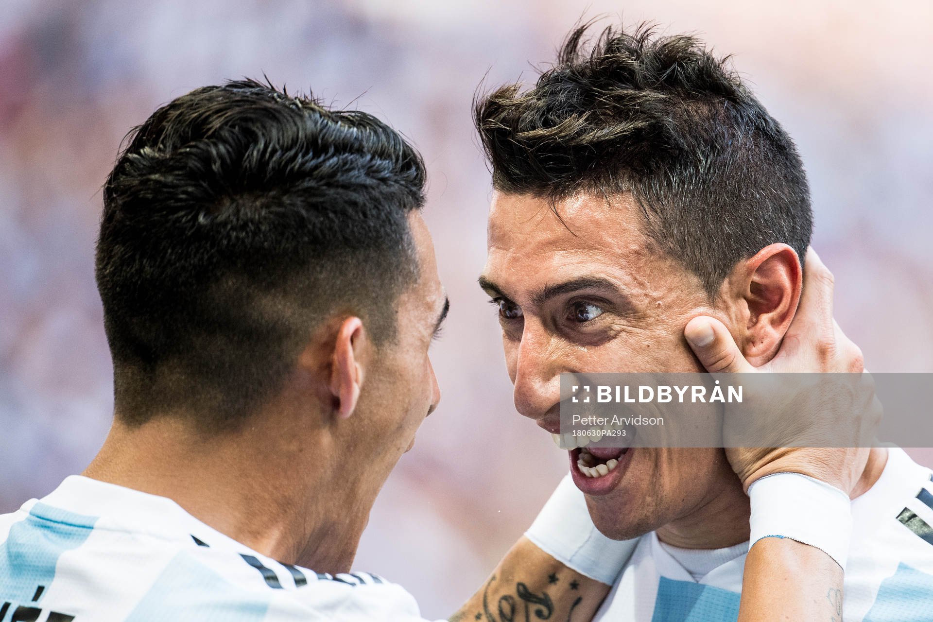 Angel Di Maria of Argentina celebrates with Cristian Pavon