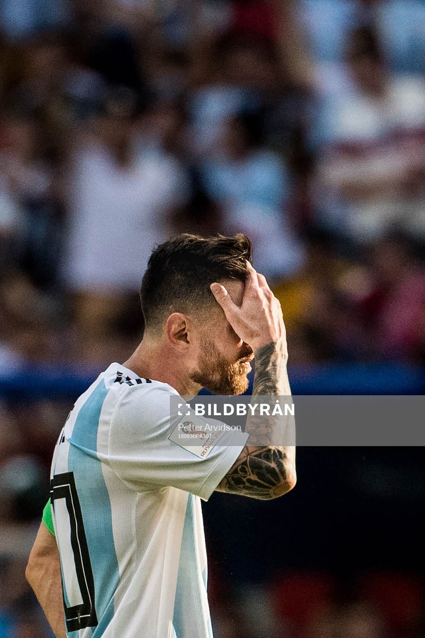 Lionel Messi of Argentina looks dejected