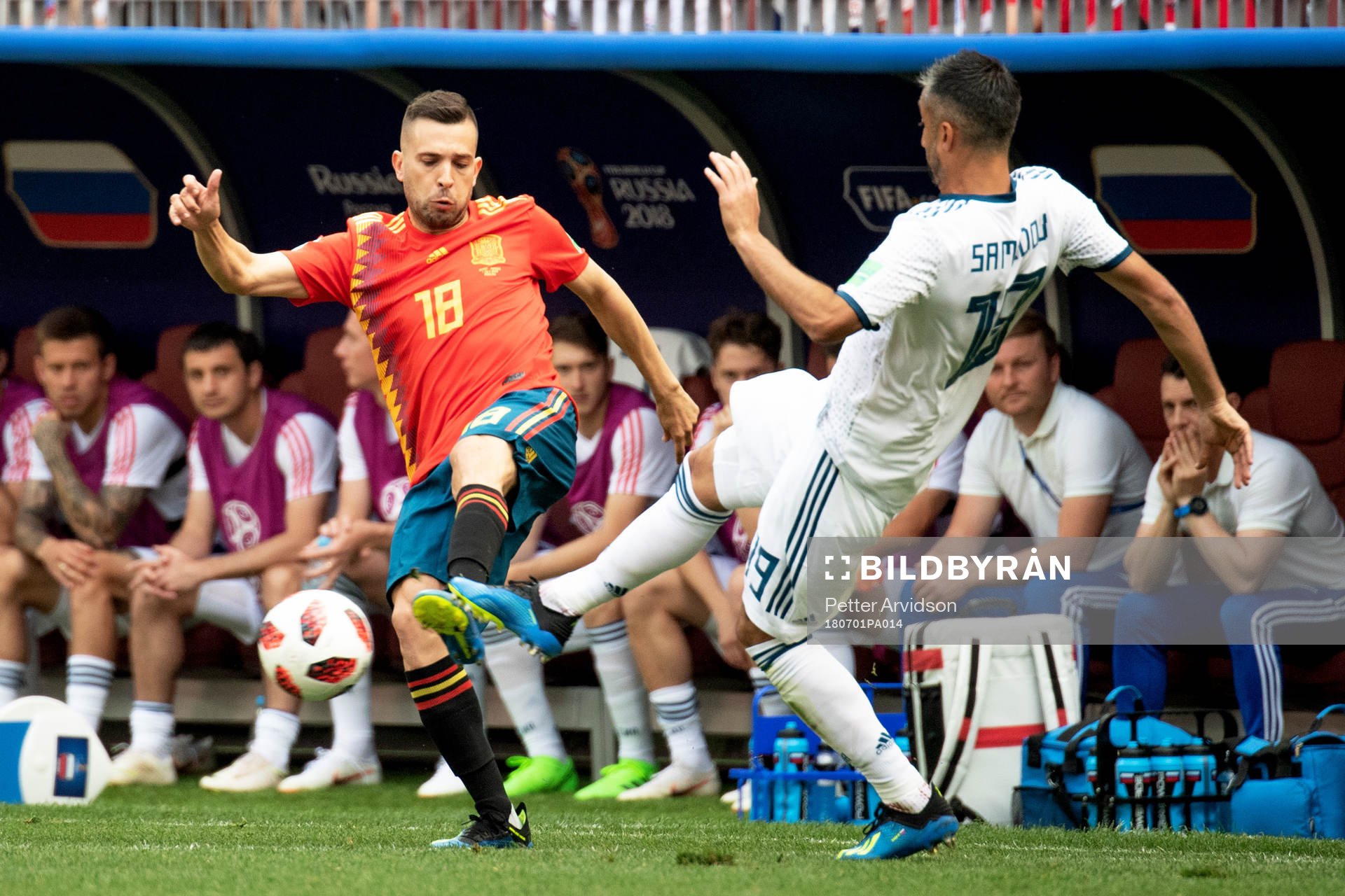 Jordi Alba of Spain and Alexey Miranchuk of Russia