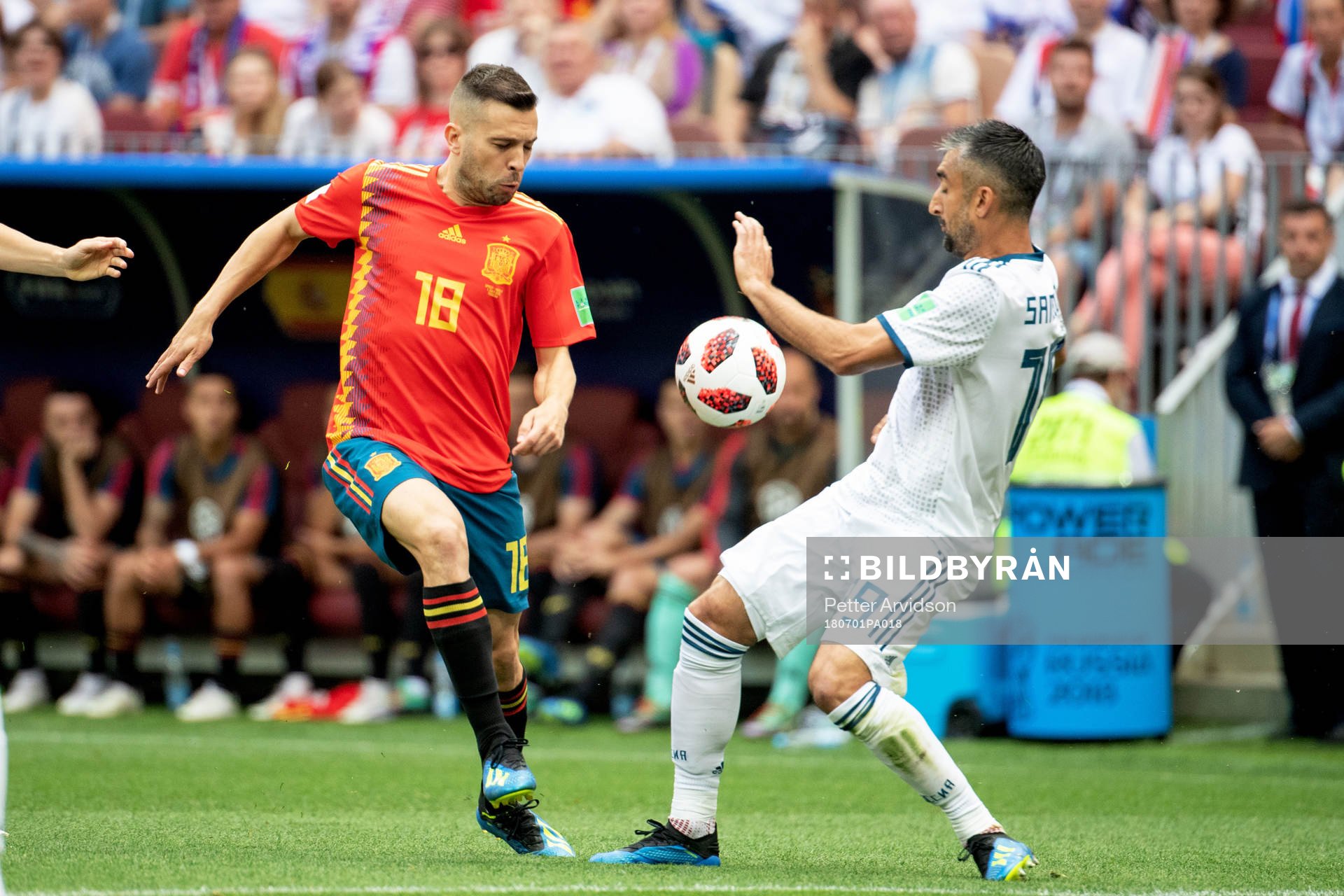 Jordi Alba of Spain and Alexander Samedov of Russia