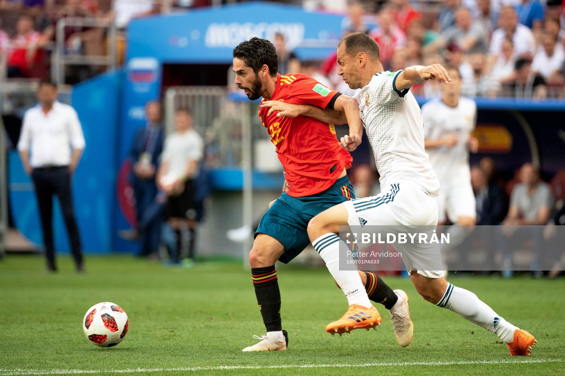 Isco of Spain and Sergey Ignashevich of Russia