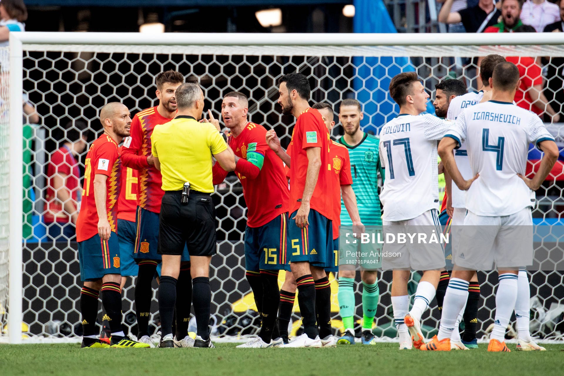 referee Björn Kuipers talks to Sergio Ramos of Spain