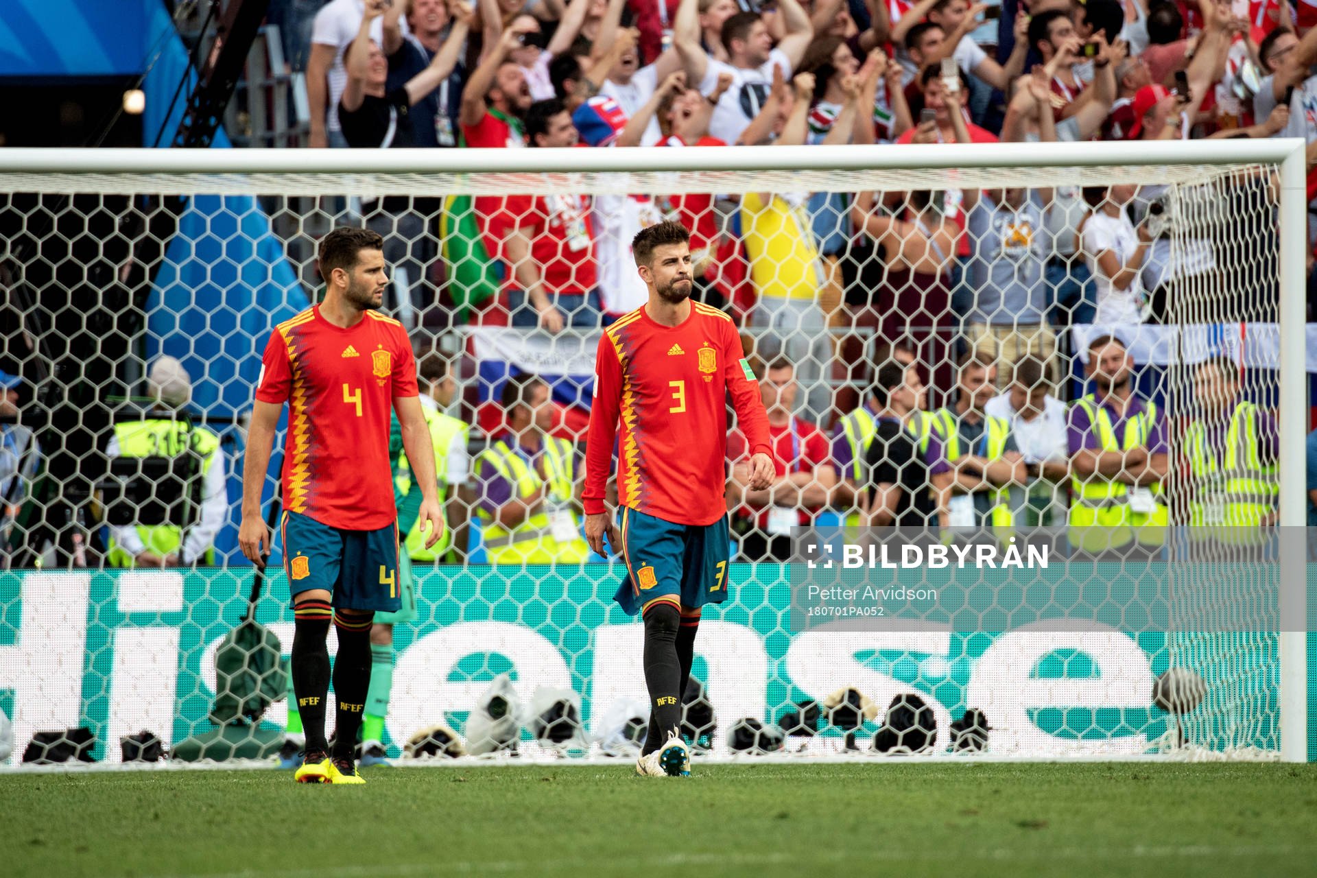 Nacho and Gerard Pique of Spain looks dejected