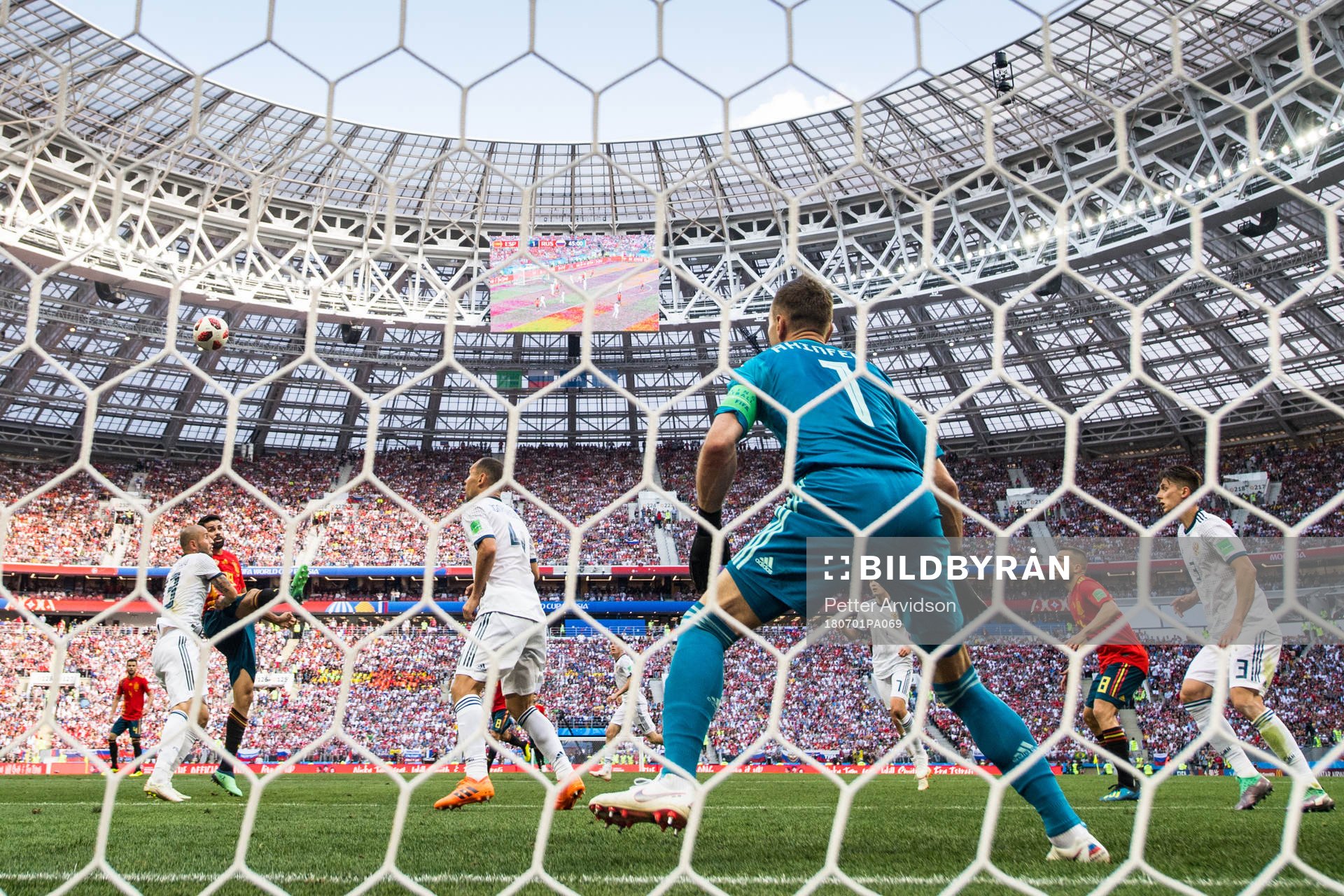 Diego Costa of Spain in action infront of goalkeeper Igor Akinfeev of Russia during the FIFA World Cup round of 16 match between Spain and Russia on July 1, 2018 in Moscow.
