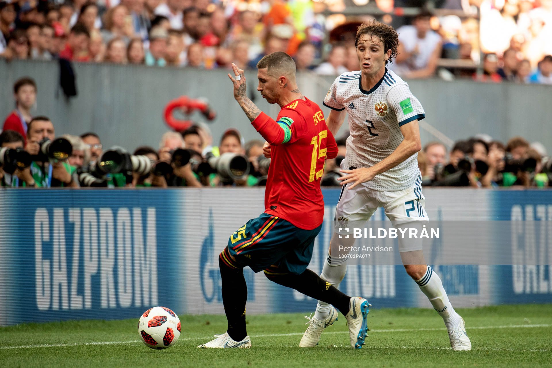 Sergio Ramos of Spain and Fernandes Mario of Russia