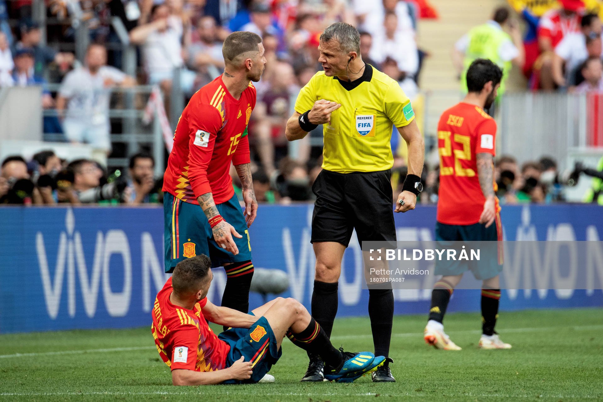 referee Björn Kuipers and Sergio Ramos of Spain