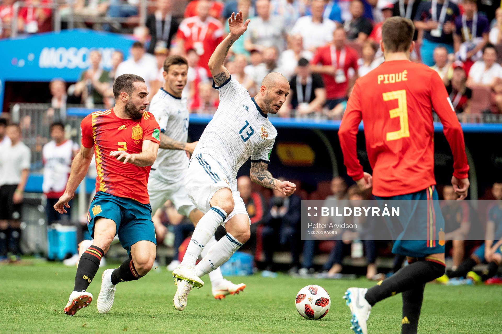Dani Carvajal of Spain and Fedor Kudriashov of Russia during the FIFA World Cup round of 16 match between Spain and Russia on July 1, 2018 in Moscow.
