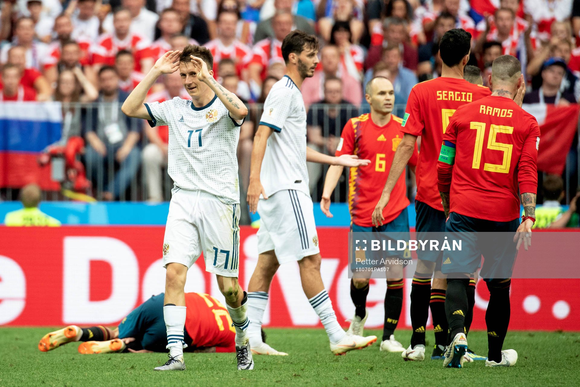 Aleksandr Golovin of Russia looks dejected