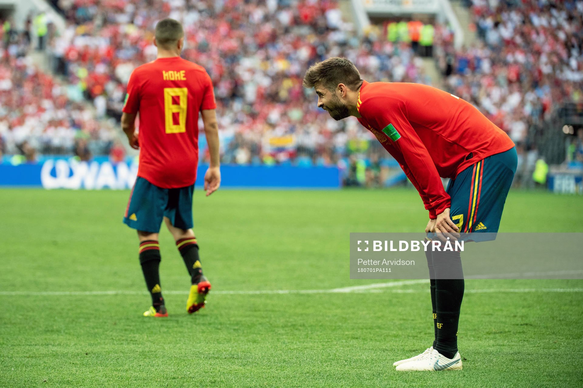 Gerard Pique of Spain looks dejected