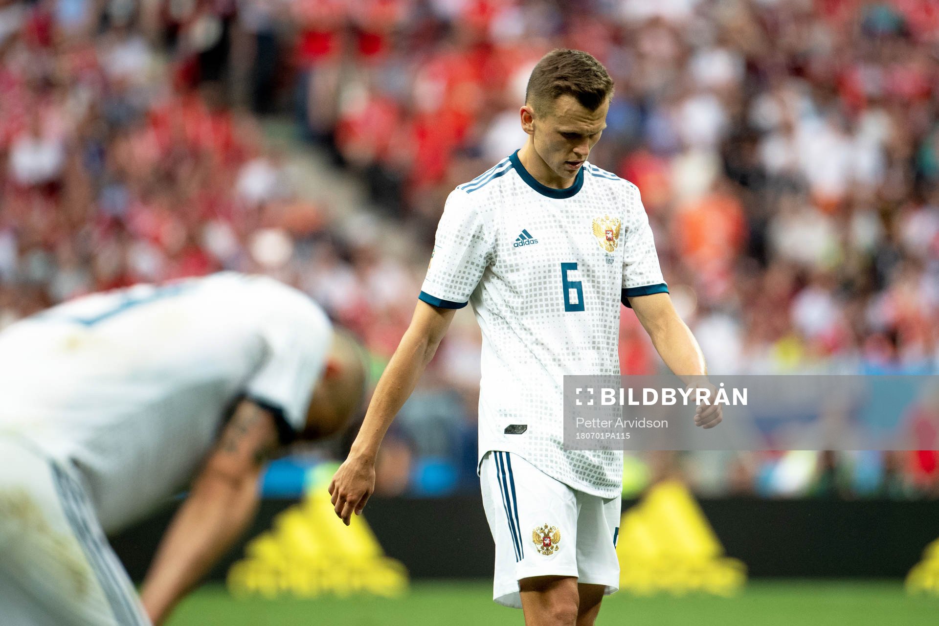 Denis Cheryshev of Russia looks dejected