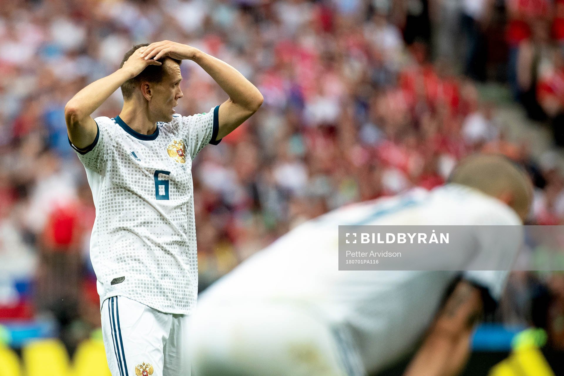 Denis Cheryshev of Russia looks dejected