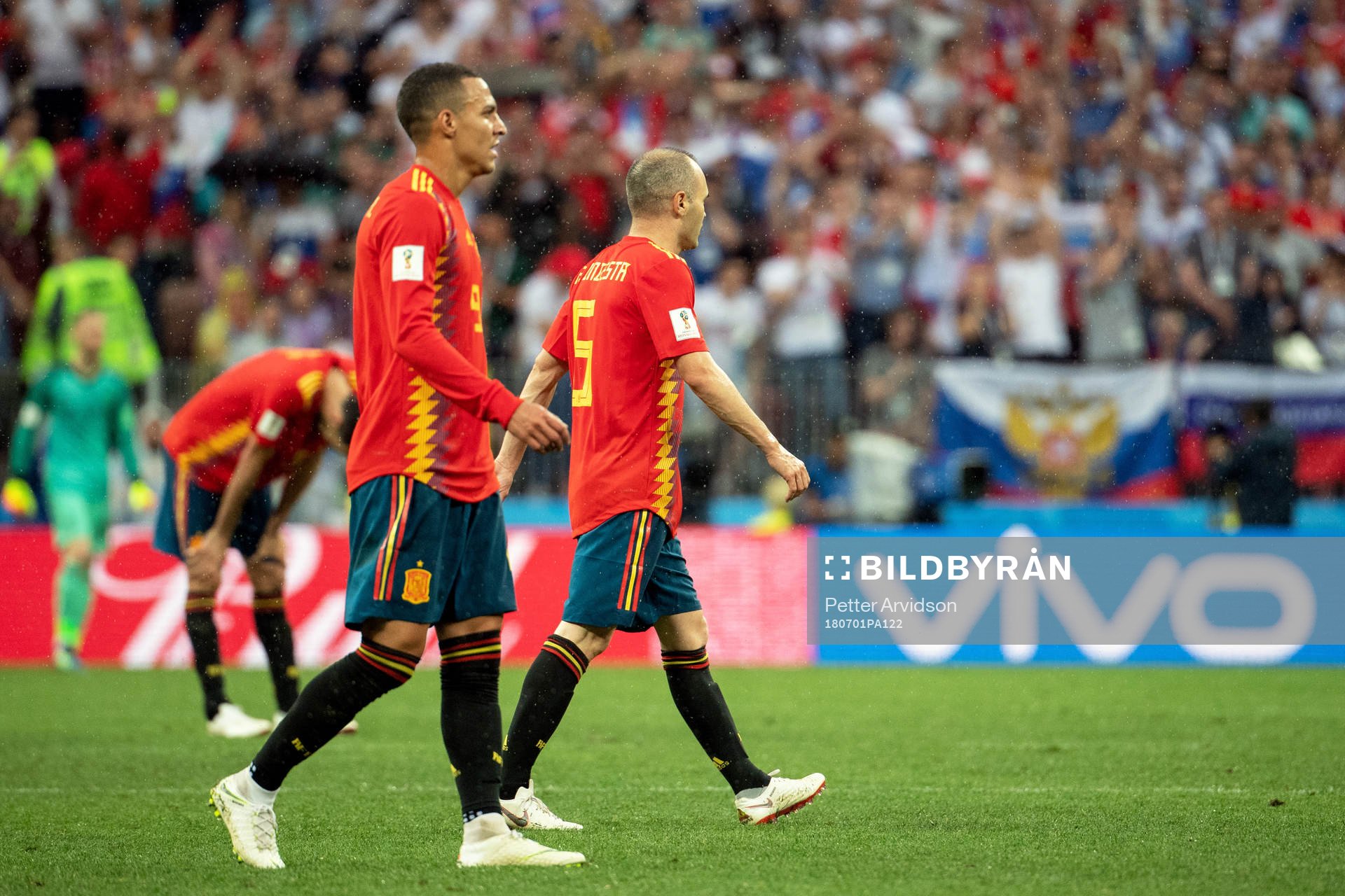 Players of Spain looks dejected