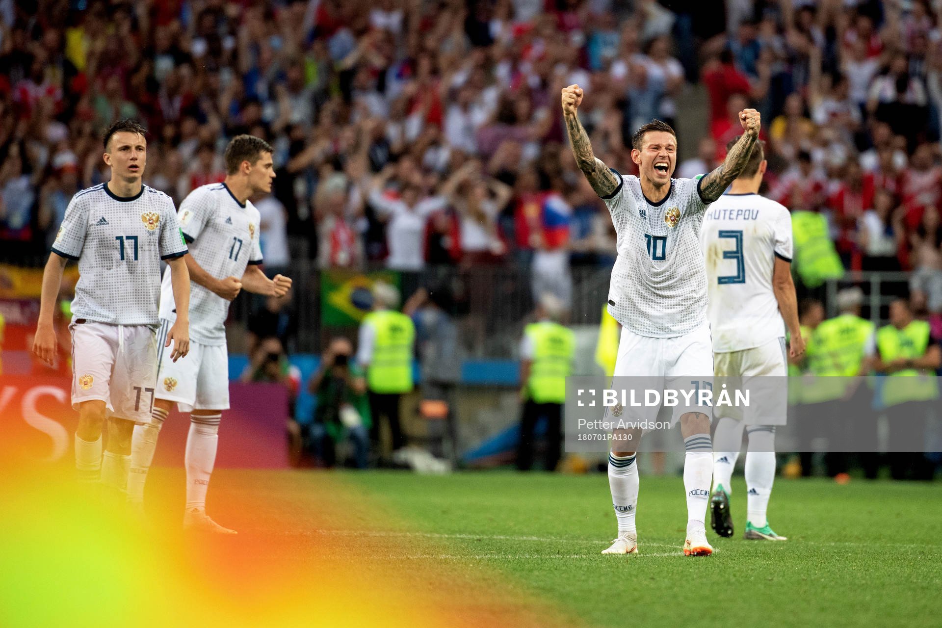 Fedor Smolov of Russia celebrates with his teammates
