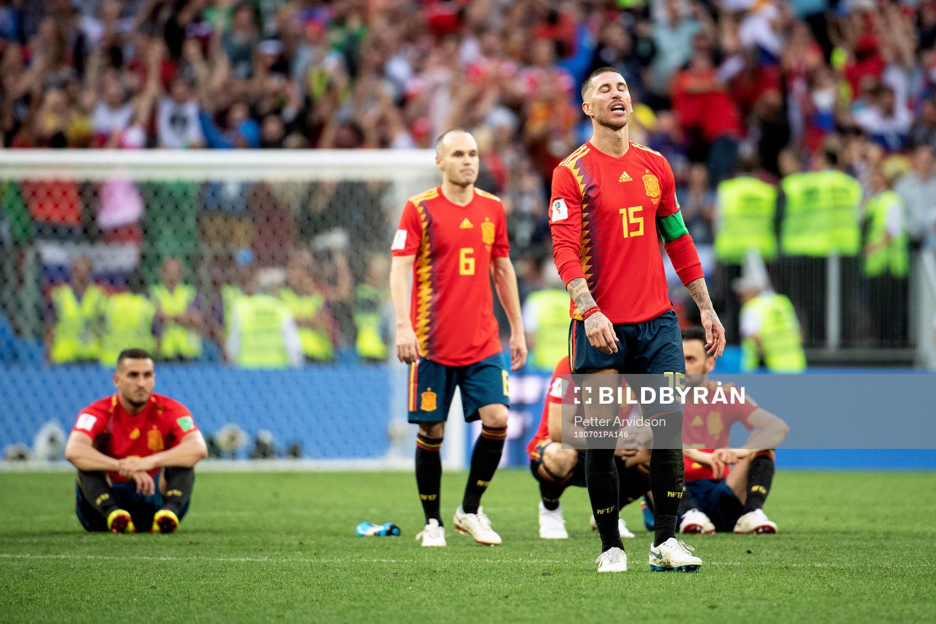 Andres Iniesta and Sergio Ramos of Spain looks dejected