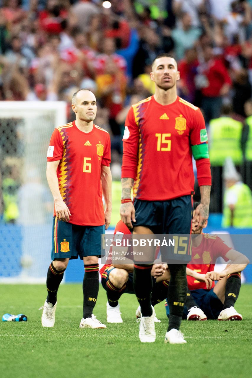Andres Iniesta and Sergio Ramos of Spain looks dejected