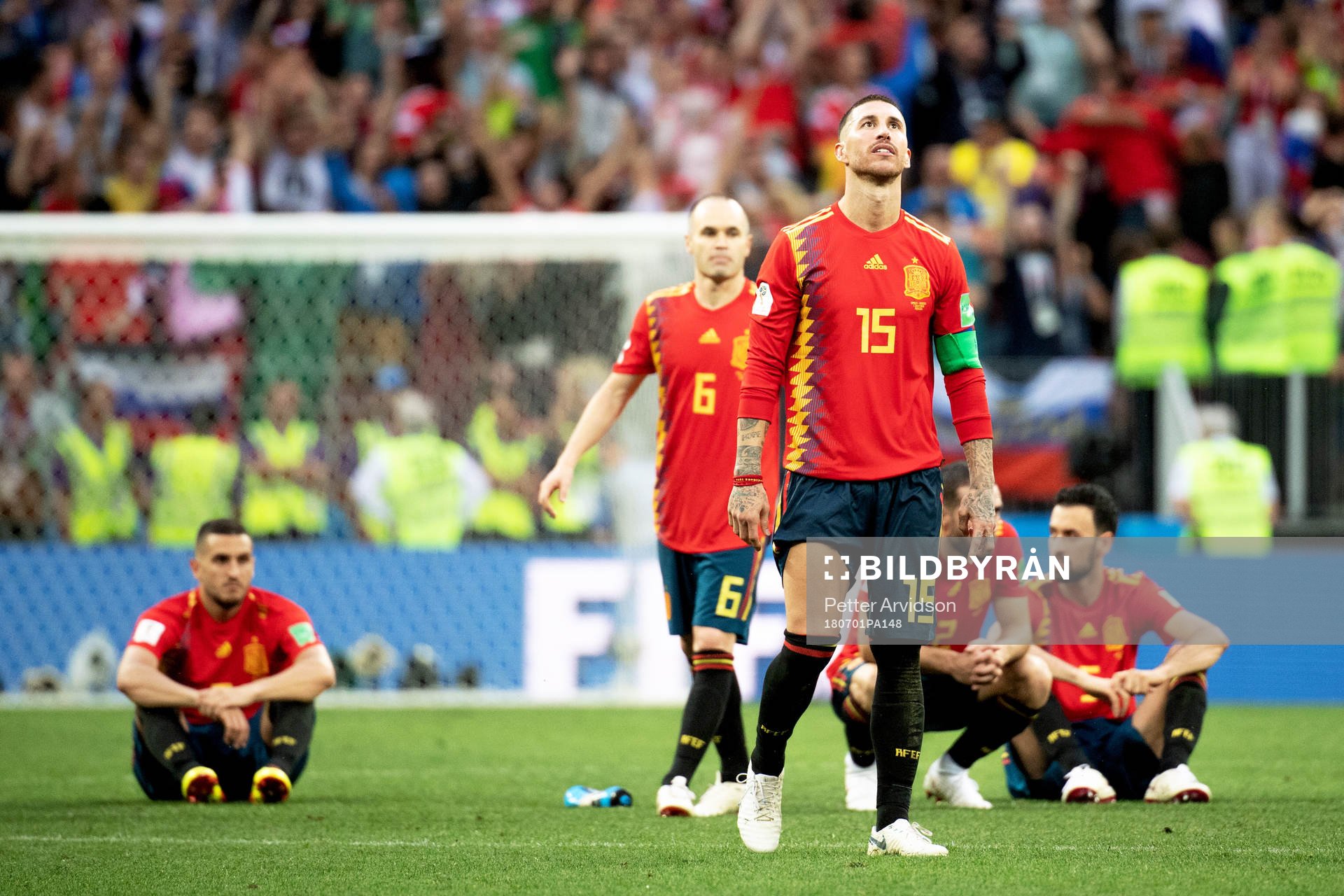 Andres Iniesta and Sergio Ramos of Spain looks dejected
