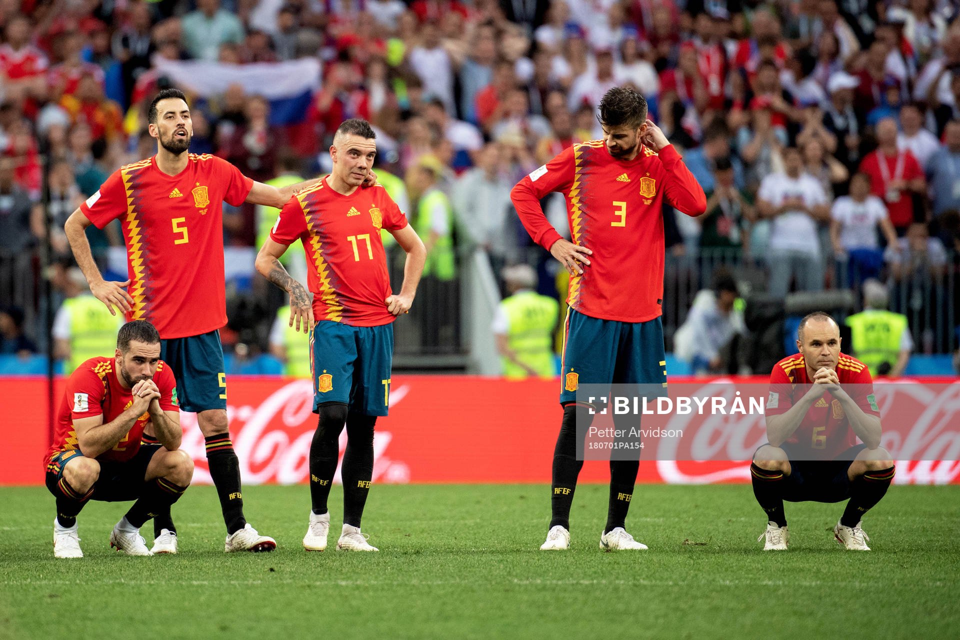Players of Spain looks dejected
