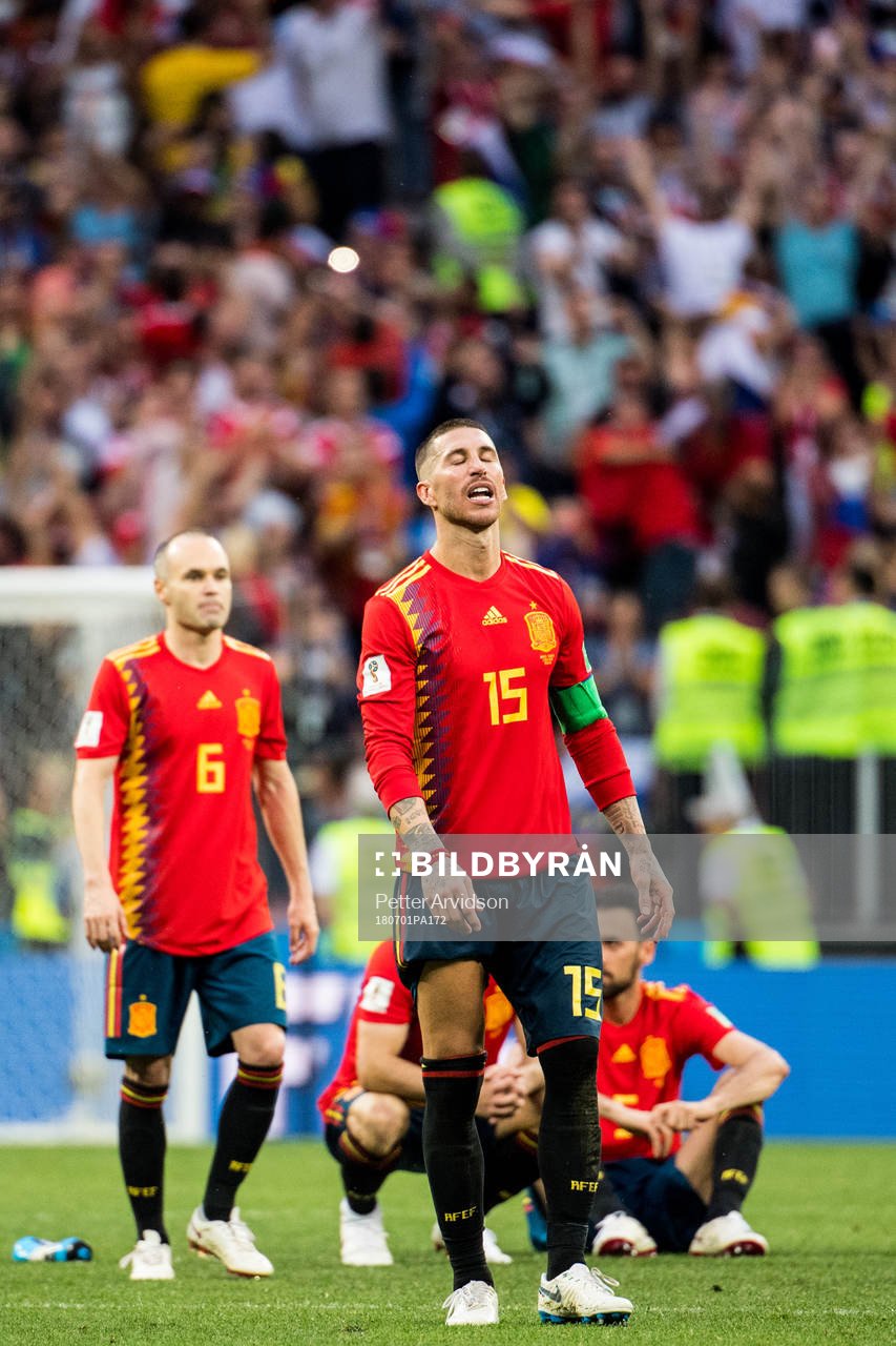 Sergio Ramos and Andres Iniesta of Spain looks dejected