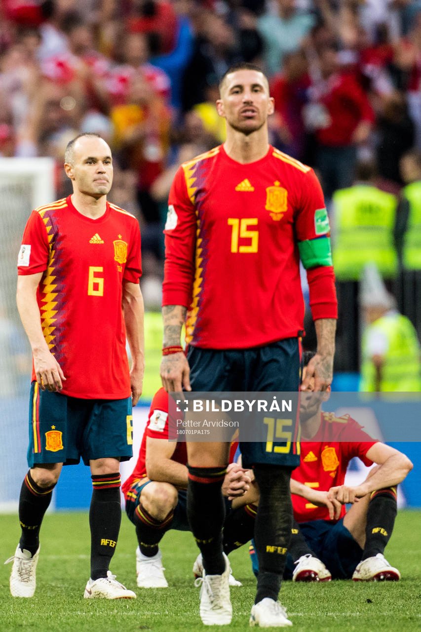 Andres Iniesta and Sergio Ramos of Spain looks dejected