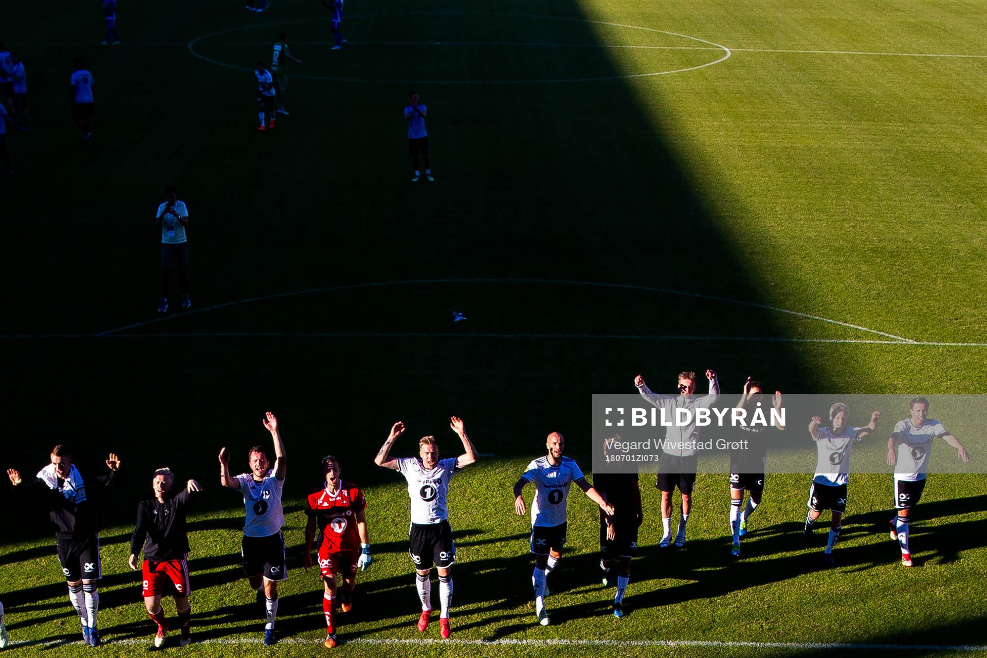 Goalkeeper André Hansen, Alexander Søderlund, Tore Reginiussen and the players of Rosenborg celebrate after the Eliteserien match between Sandefjord and Rosenborg on July 1, 2018 in Sandefjord.