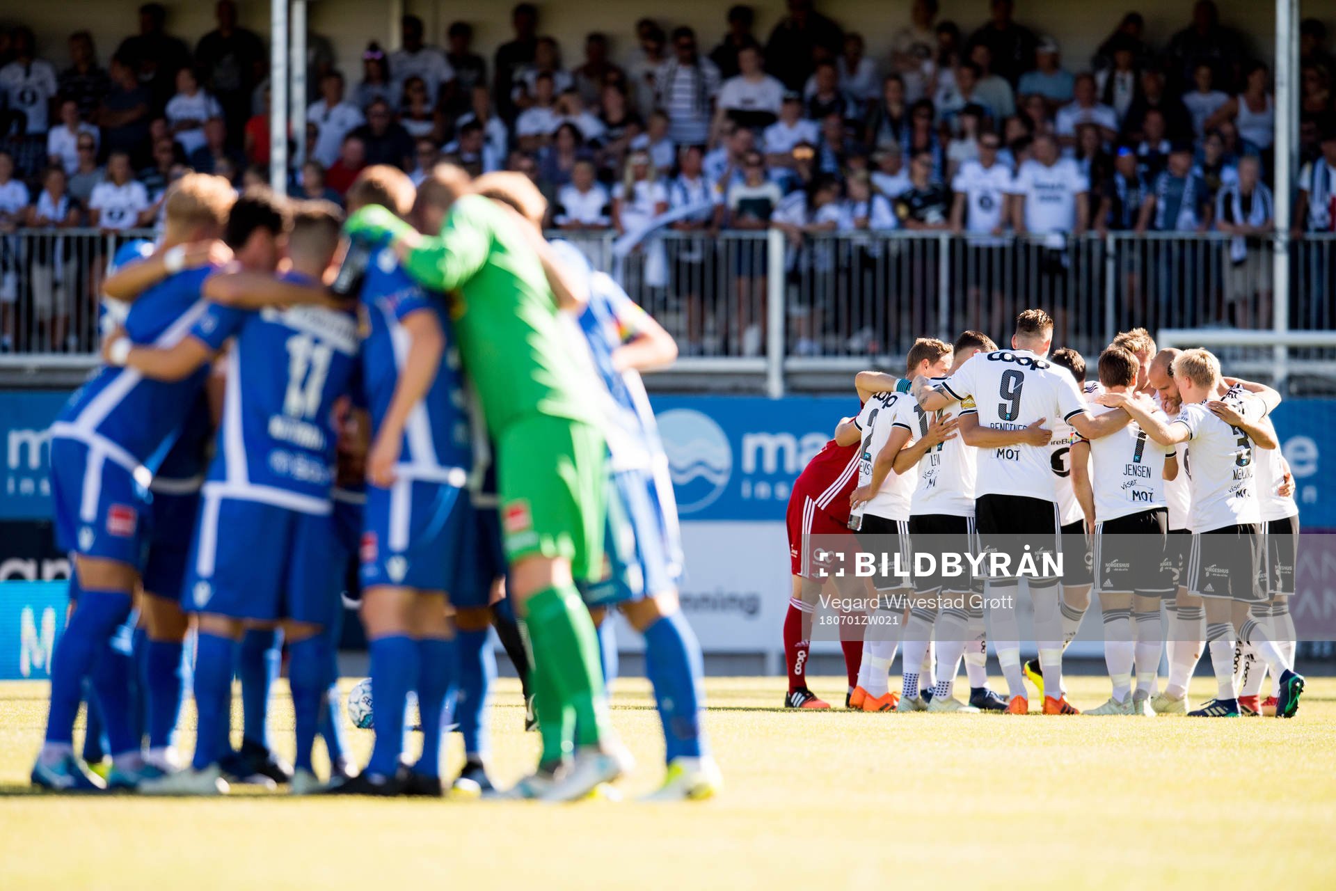The two team gather