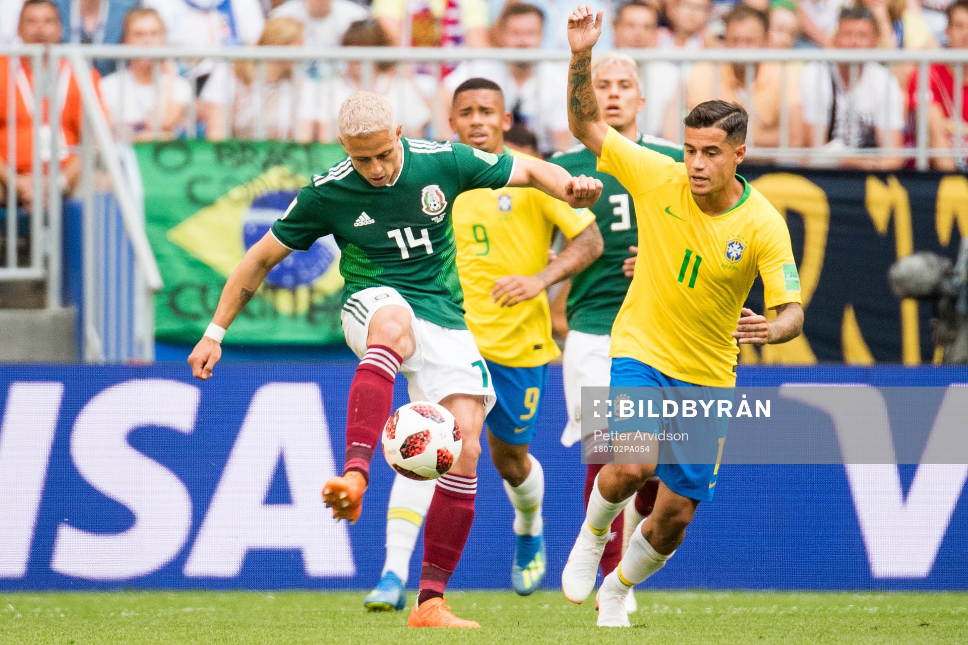 Javier Hernandez of Mexico and Philippe Coutinho of Brazil