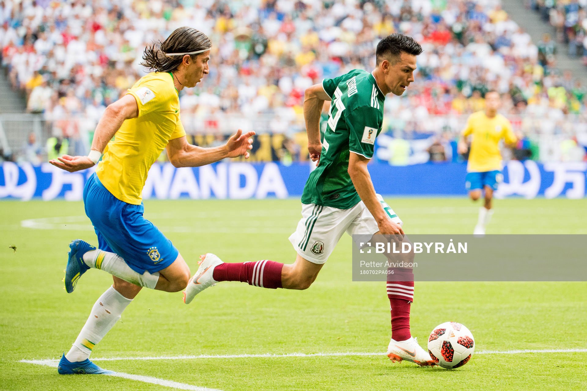 Filipe Luis of Brazil and Hirving Lozano of Mexico