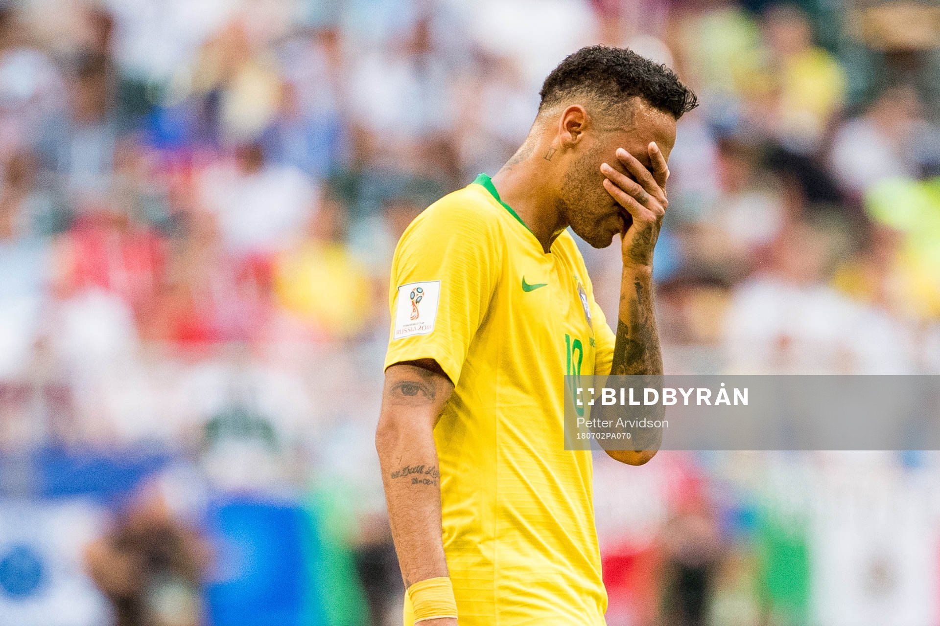 Neymar of Brazil looks dejected