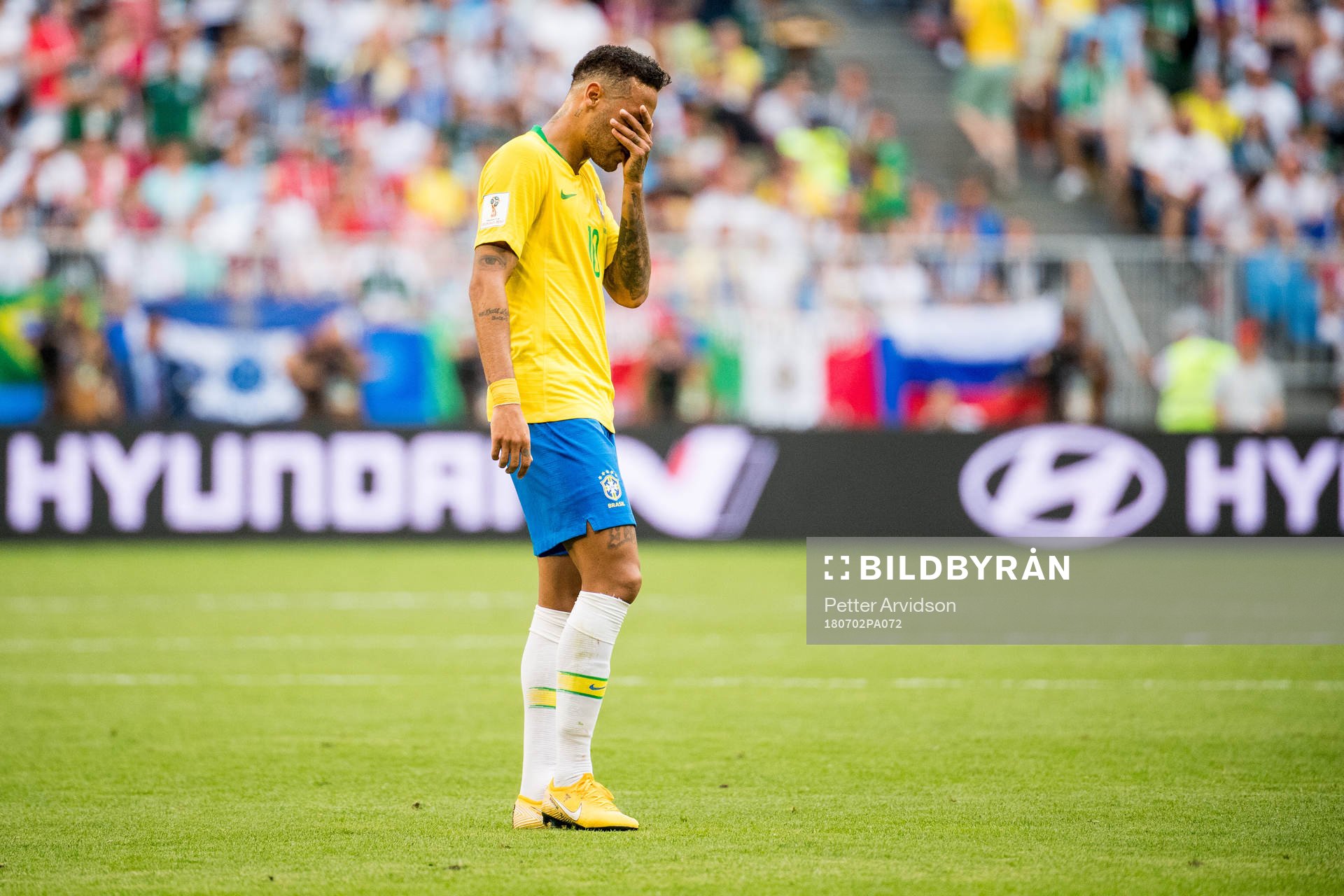 Neymar of Brazil looks dejected