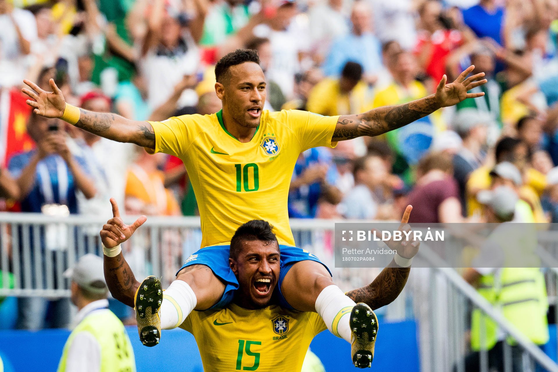 Neymar and Paulinho of Brazil celebrate the 1-0 goal