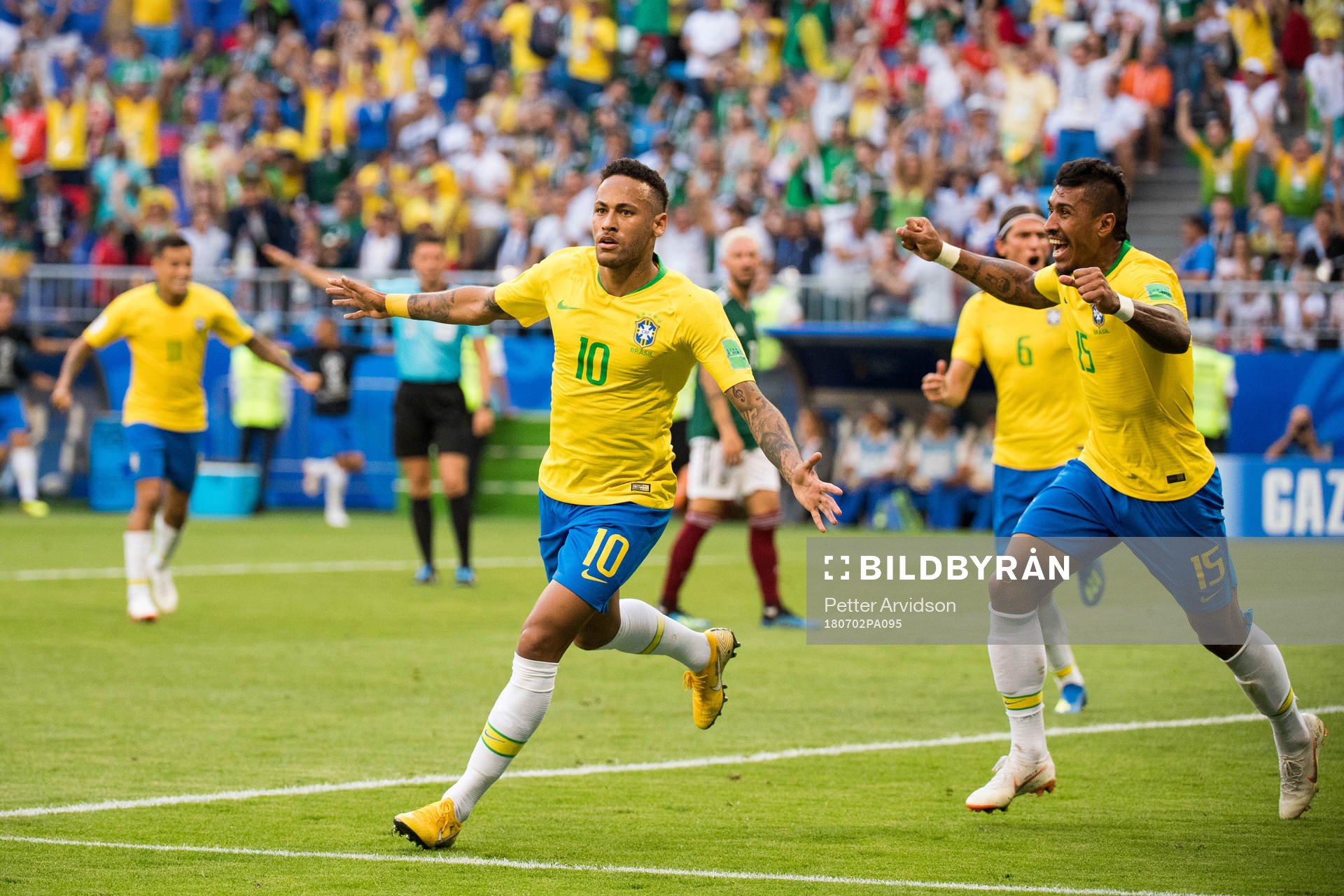 Neymar and Paulinho of Brazil celebrate the 1-0 goal