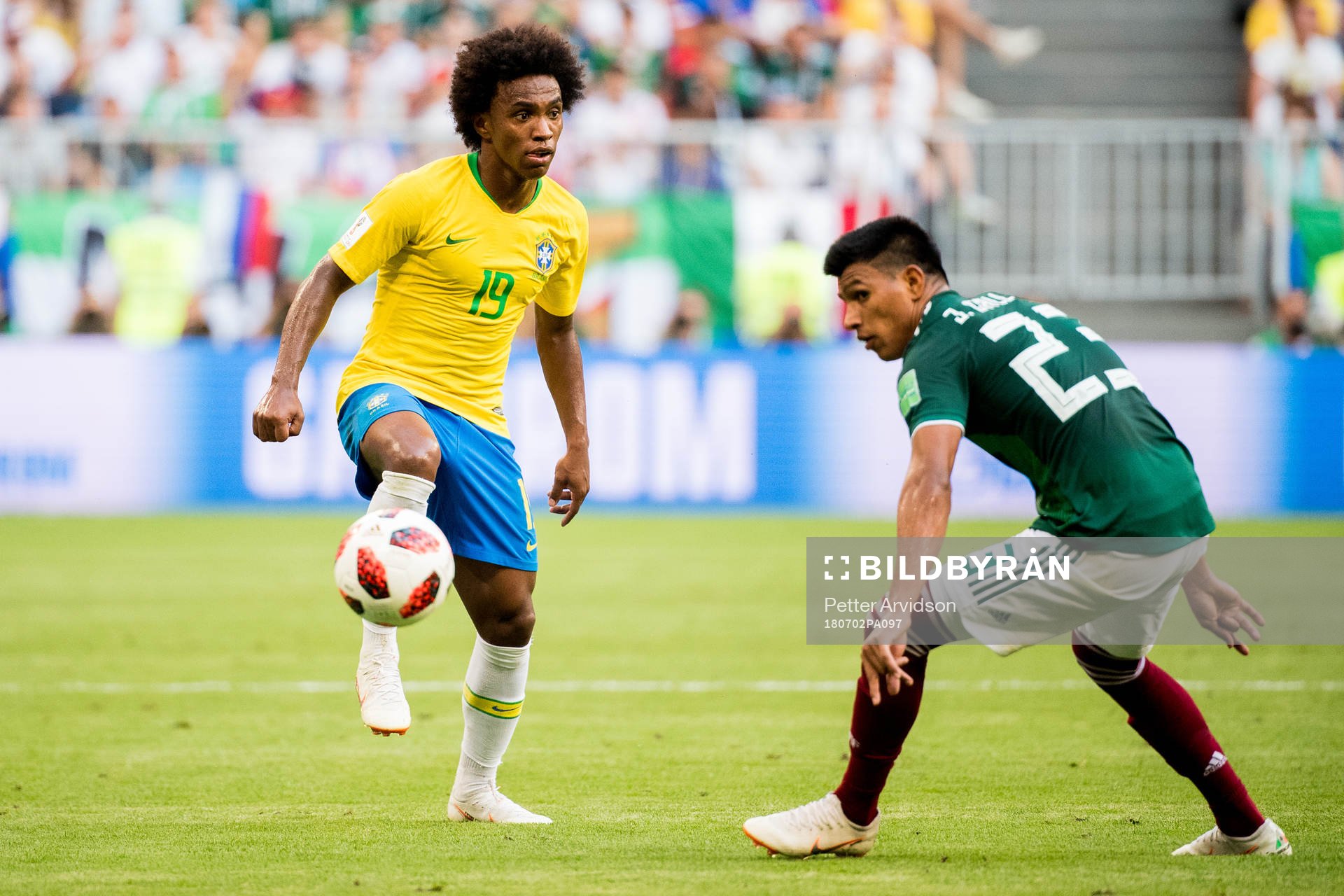 Willian of Brazil and Jesus Gallardo of Mexico