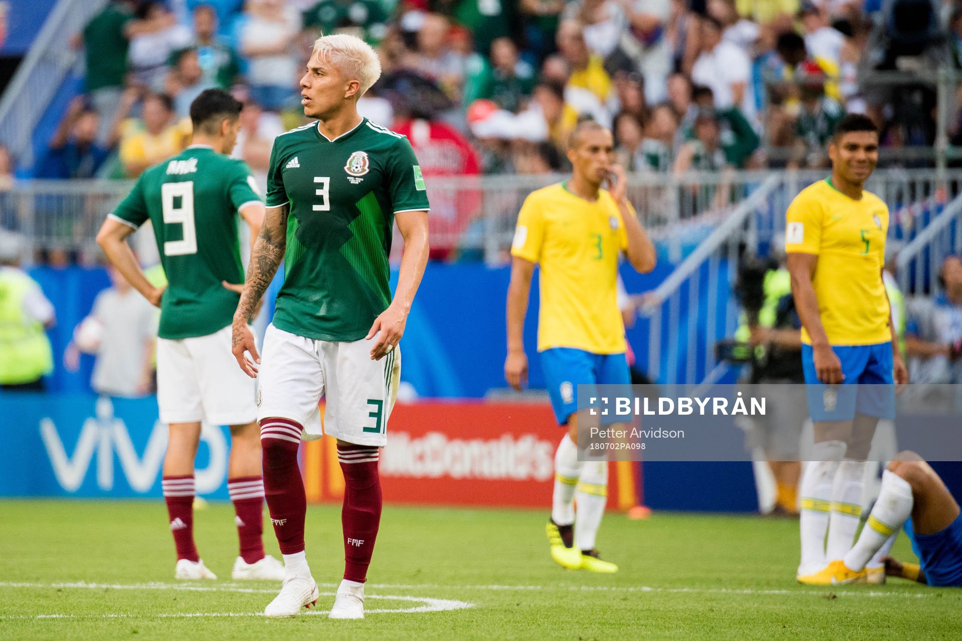 Carlos Salcedo of Mexico looks dejected