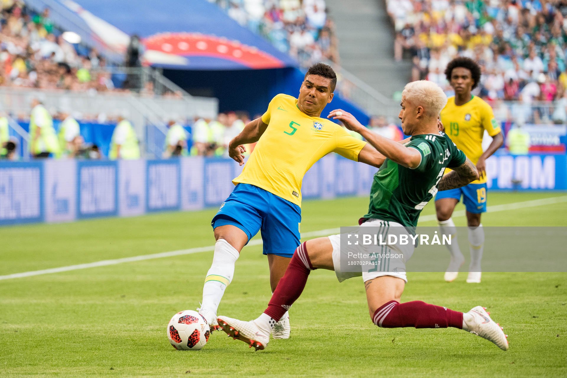 Casemiro of Brazil and Carlos Salcedo of Mexico
