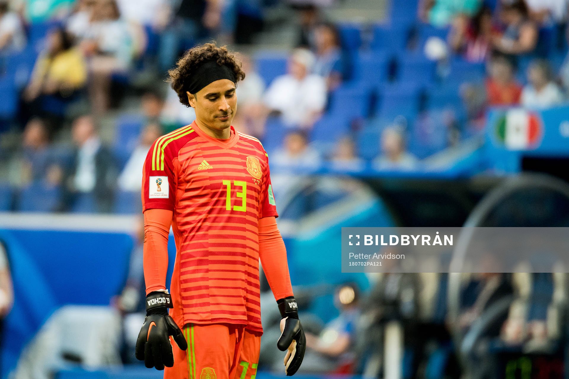 Goalkeeper Guillermo Ochoa of Mexico looks dejected