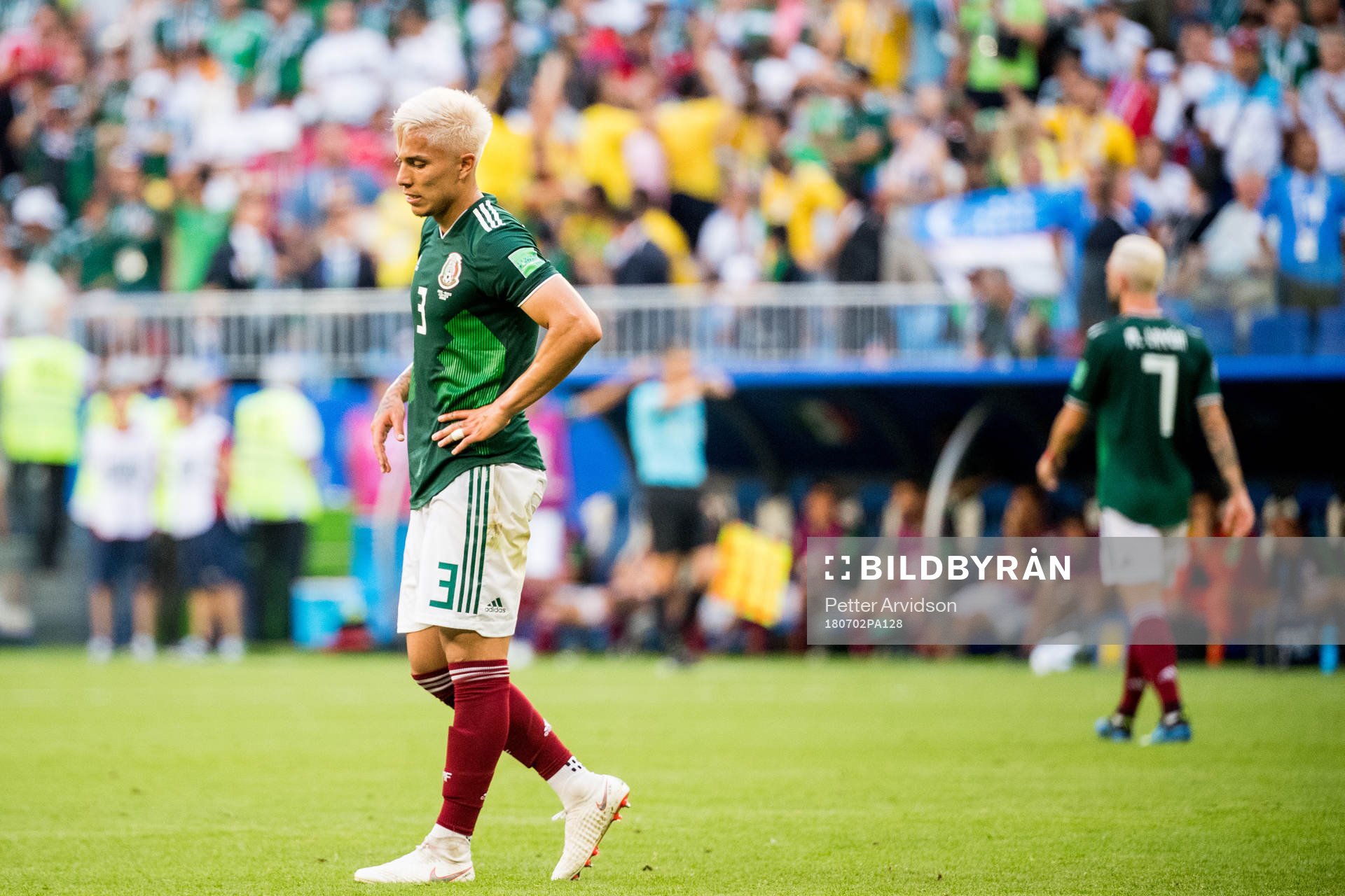 Carlos Salcedo of Mexico looks dejected