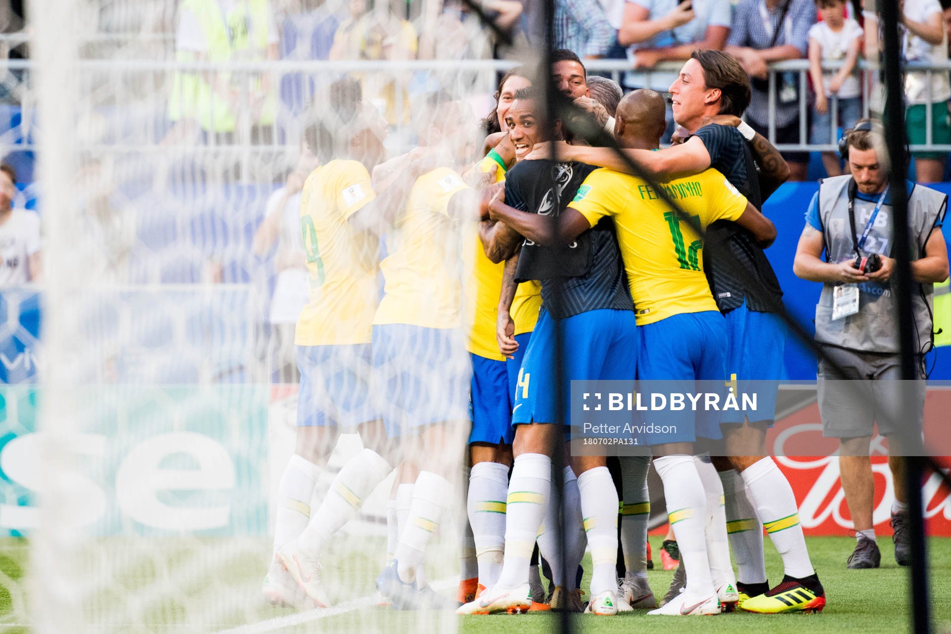 Players of Brazil celebrates the 2-0 goal by Roberto Firmino