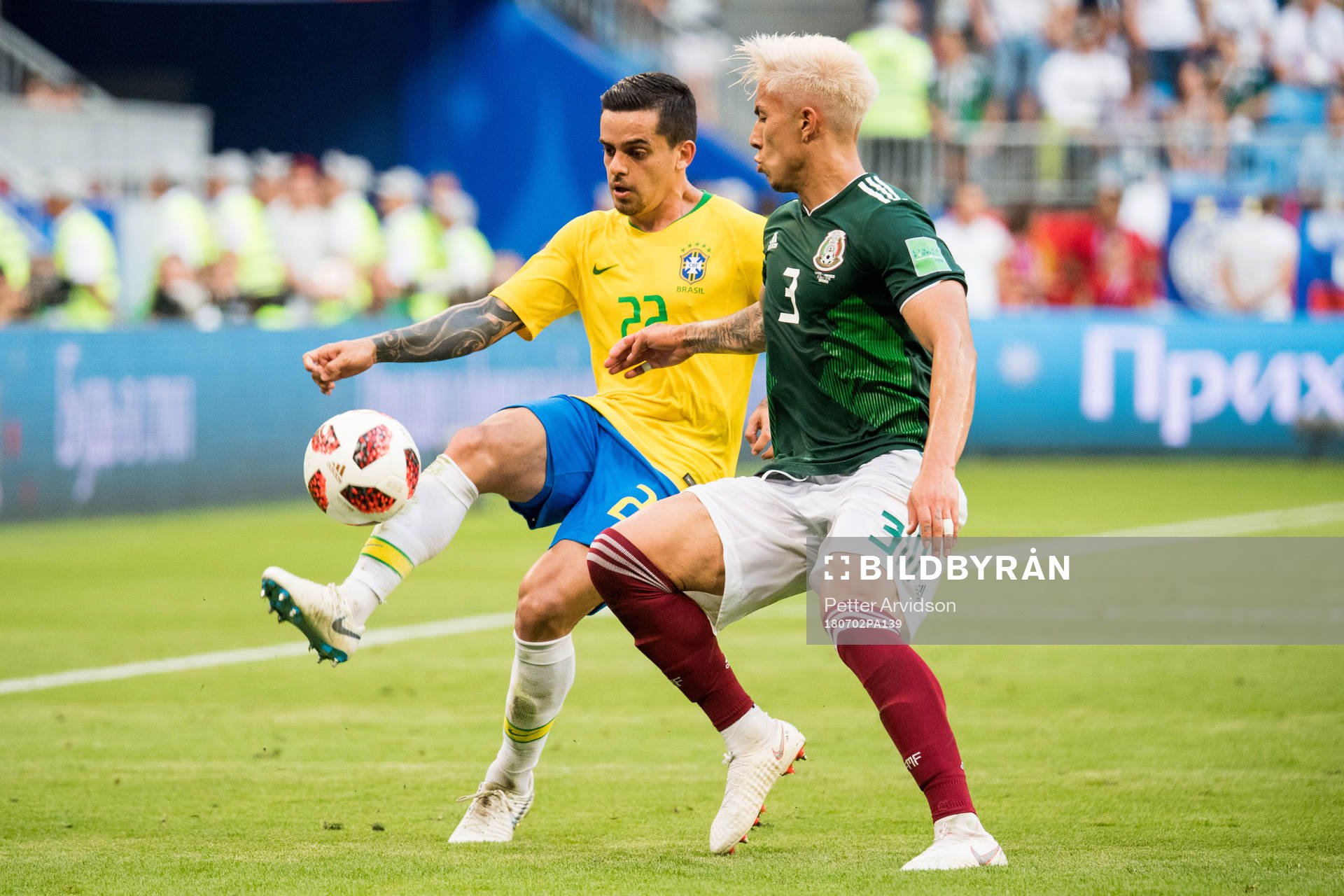 Fagner of Brazil and Carlos Salcedo of Mexico