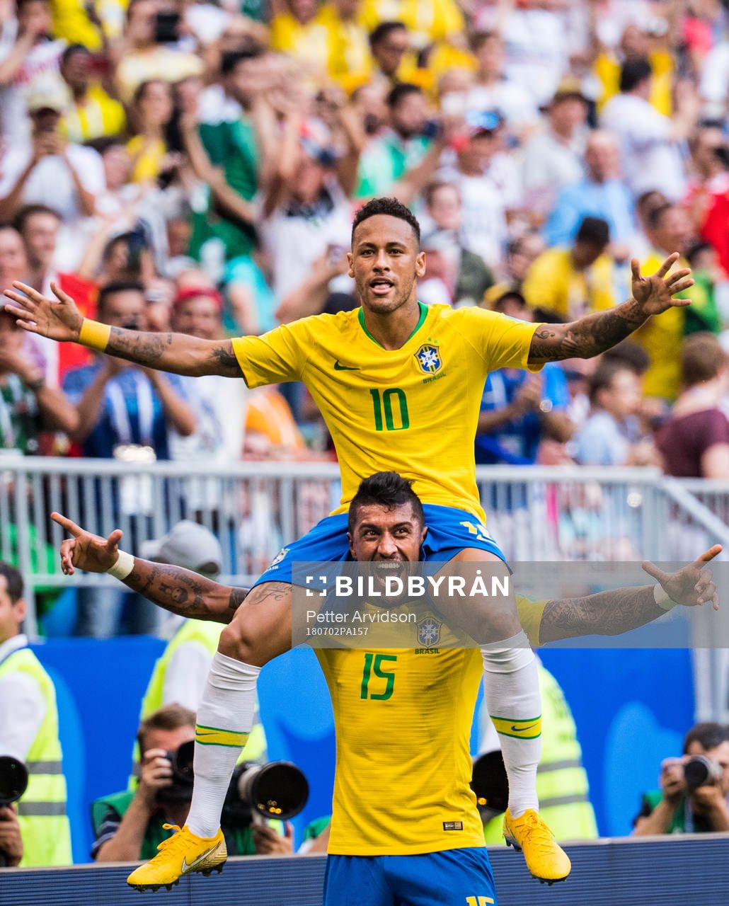 Neymar of Brazil celebrates with Paulinho