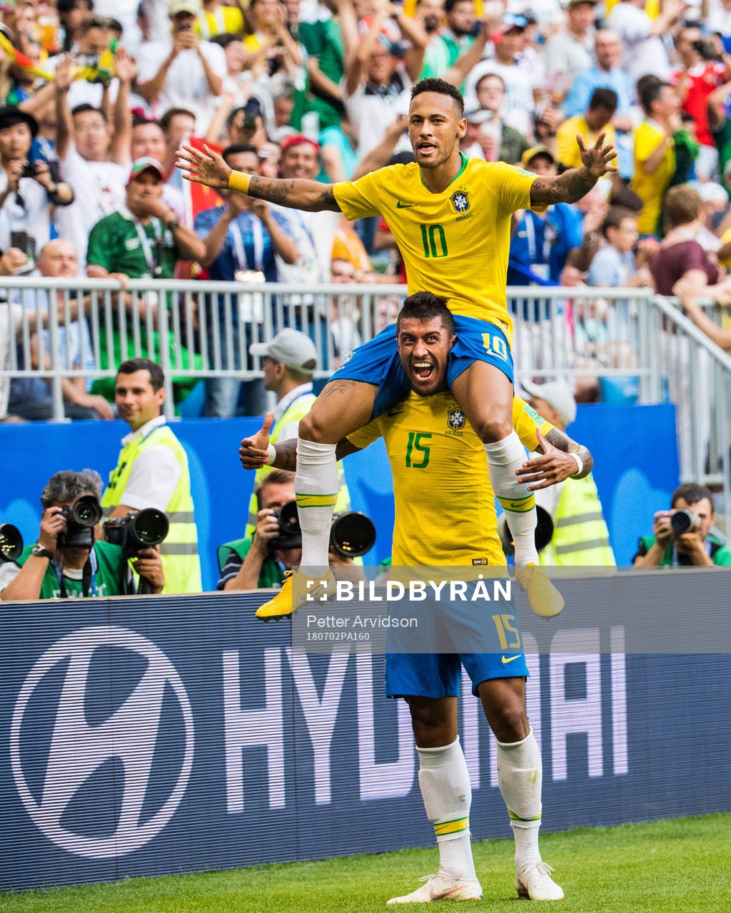 Neymar of Brazil celebrates with Paulinho
