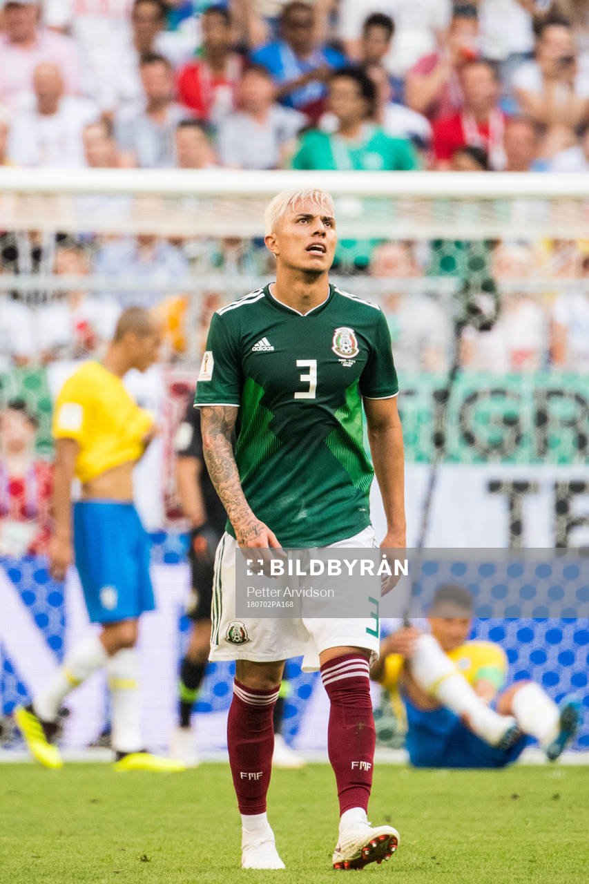 Carlos Salcedo of Mexico looks dejected