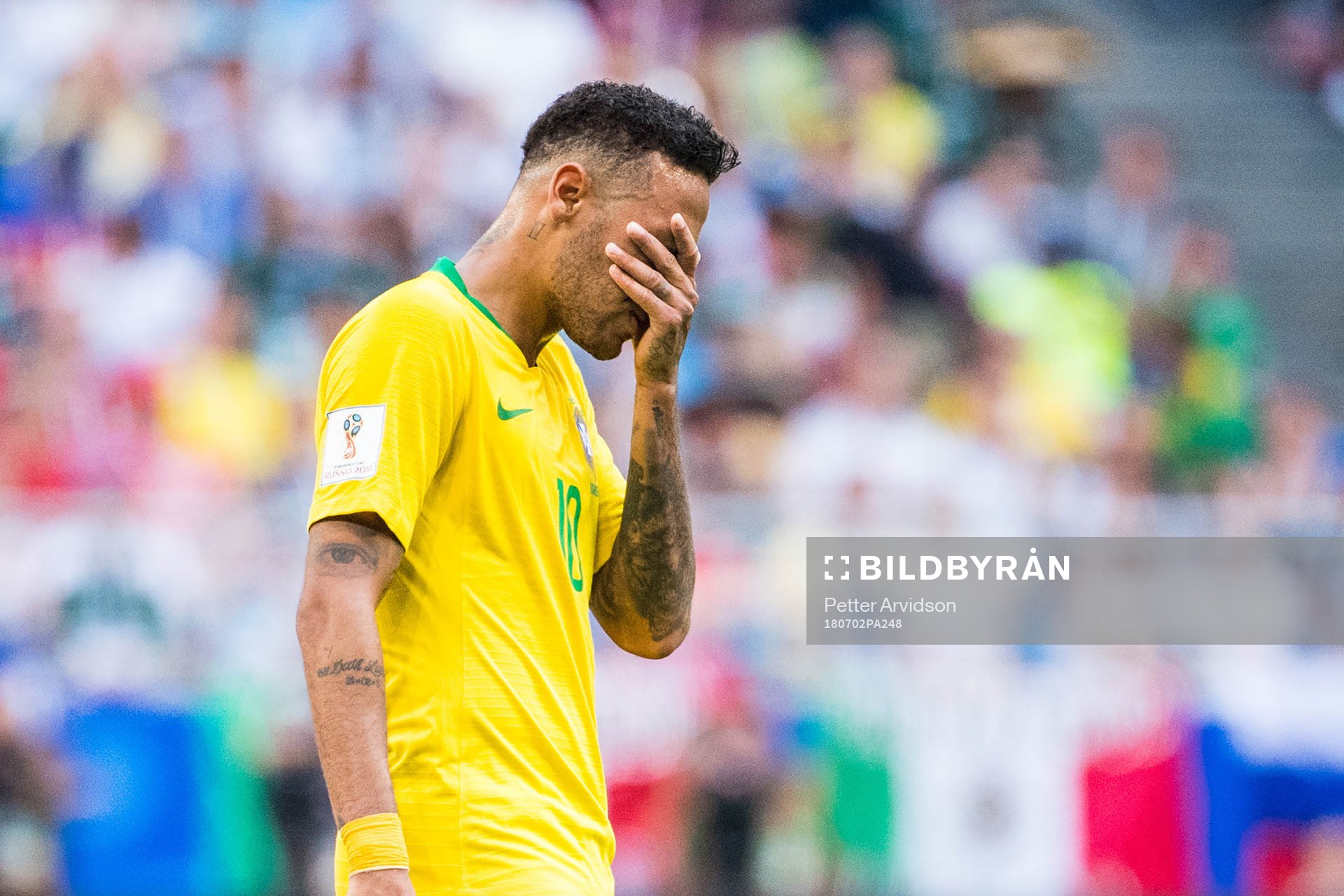 Neymar of Brazil looks dejected
