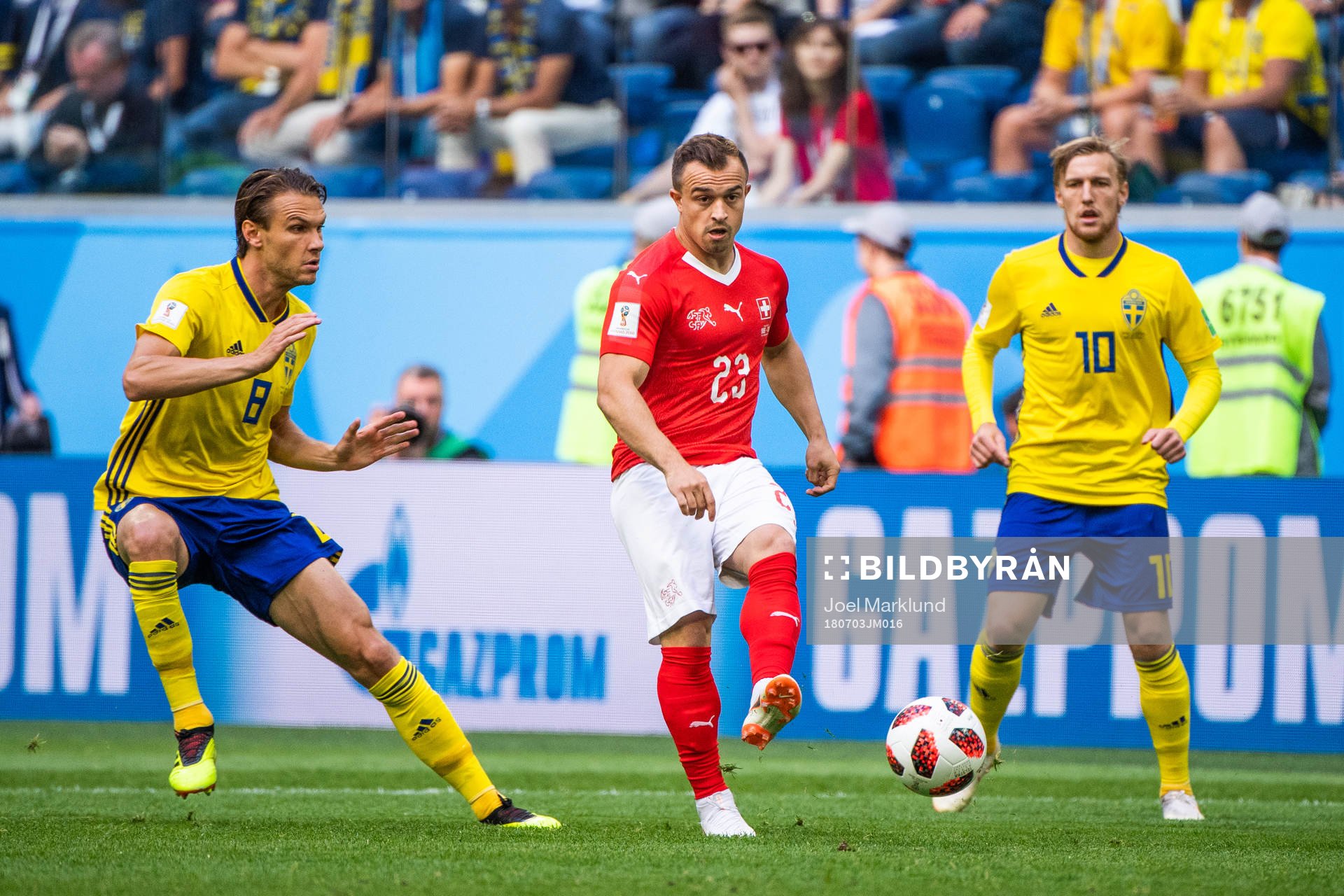 Albin Ekdal and Emil Forsberg with Xherdan Shaqiri of