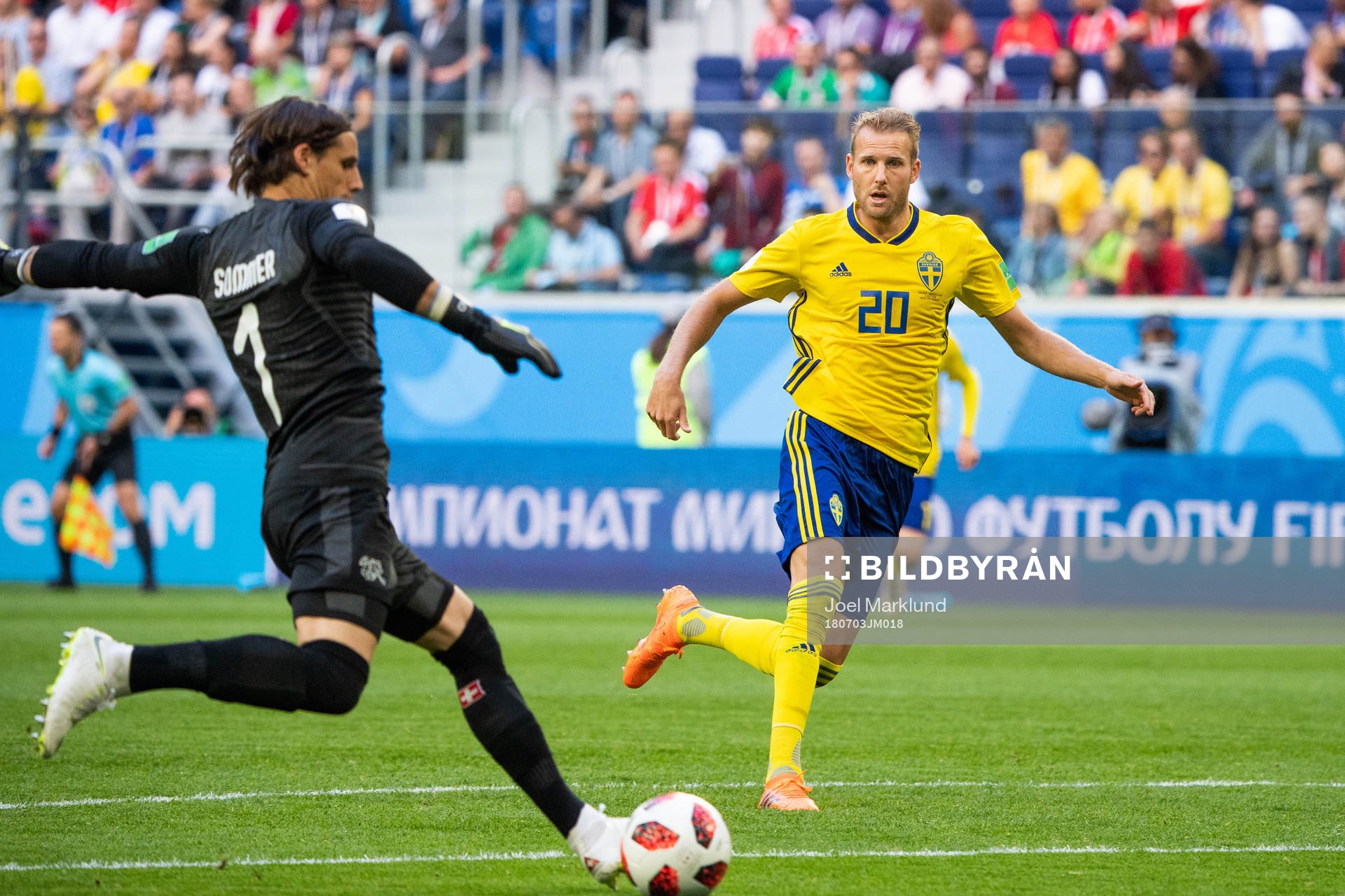 goalkeeper Yann Sommer clears the ball in fornt of Ola