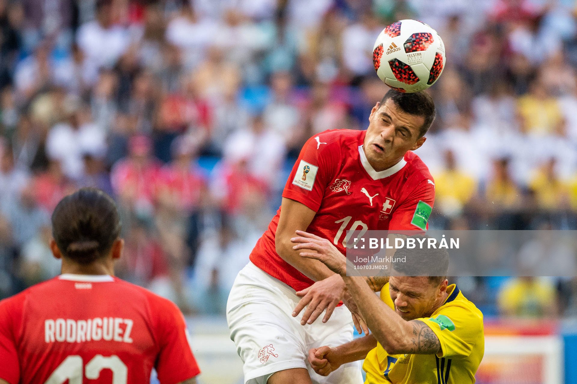 Granit Xhaka of Switzerland and Marcus Berg of Sweden