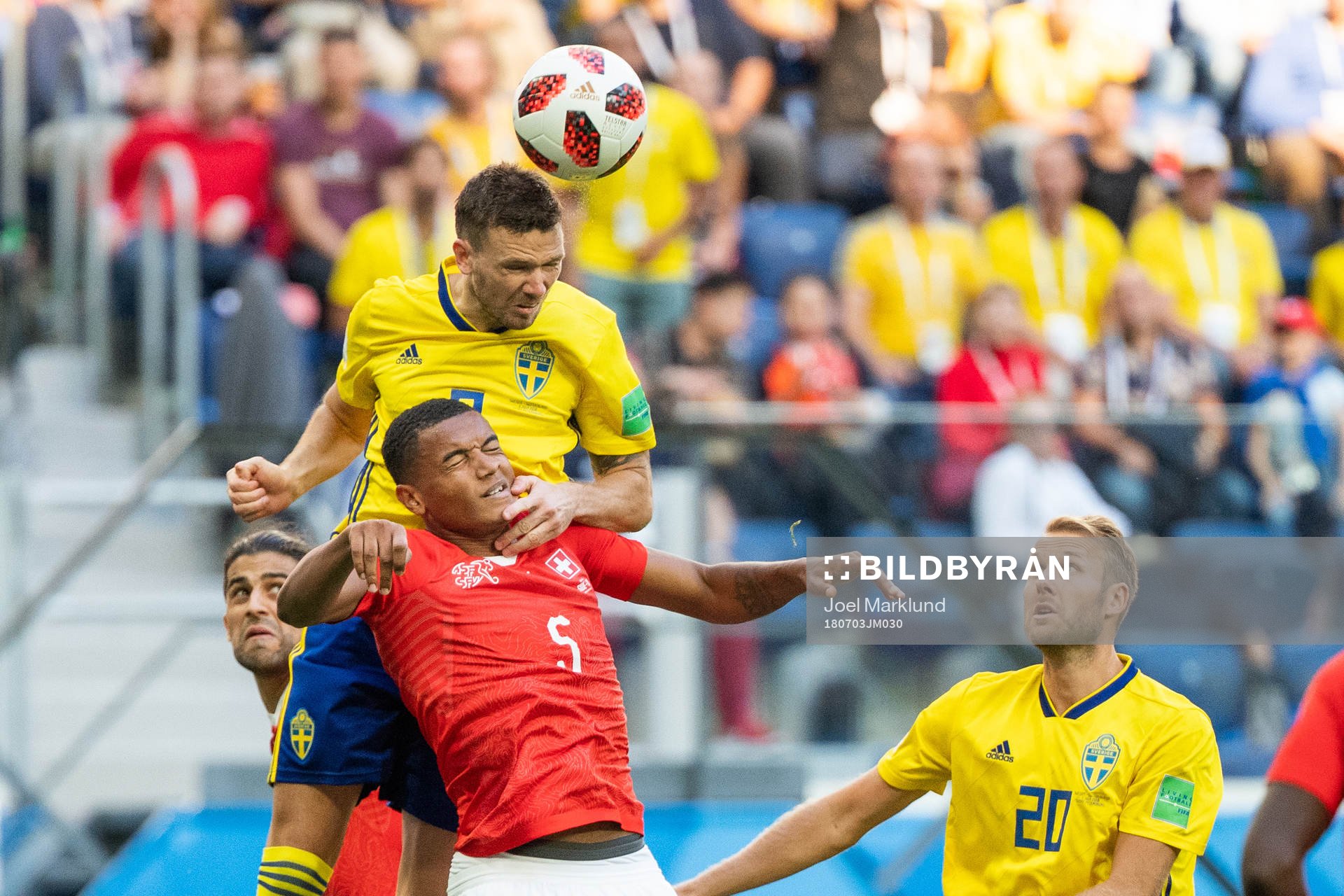 Marcus Berg and Ola Toivonen competes for the ball with