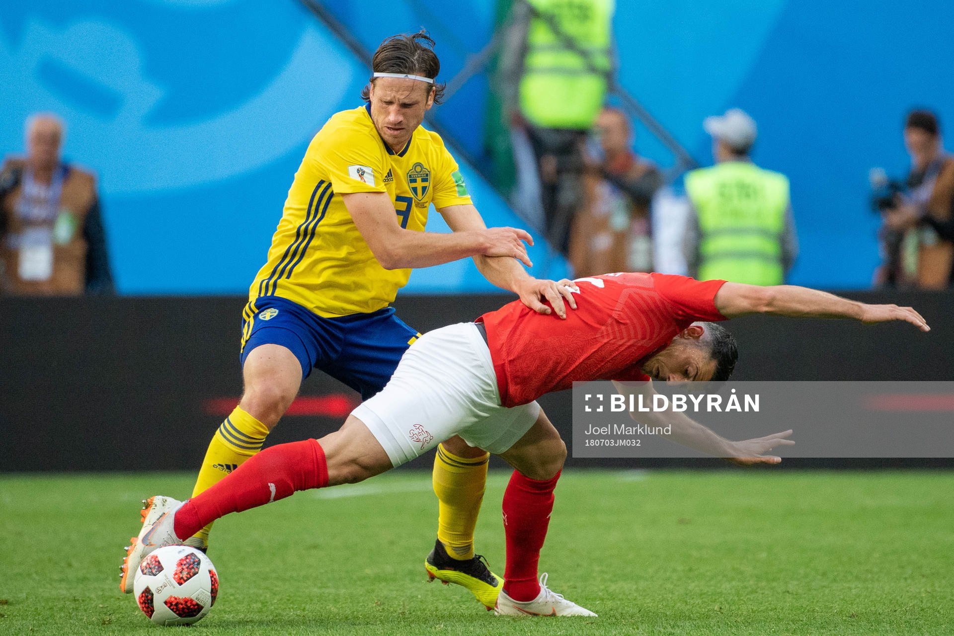 Gustav Svensson of Sweden and Manuel Akanji of Switzerland