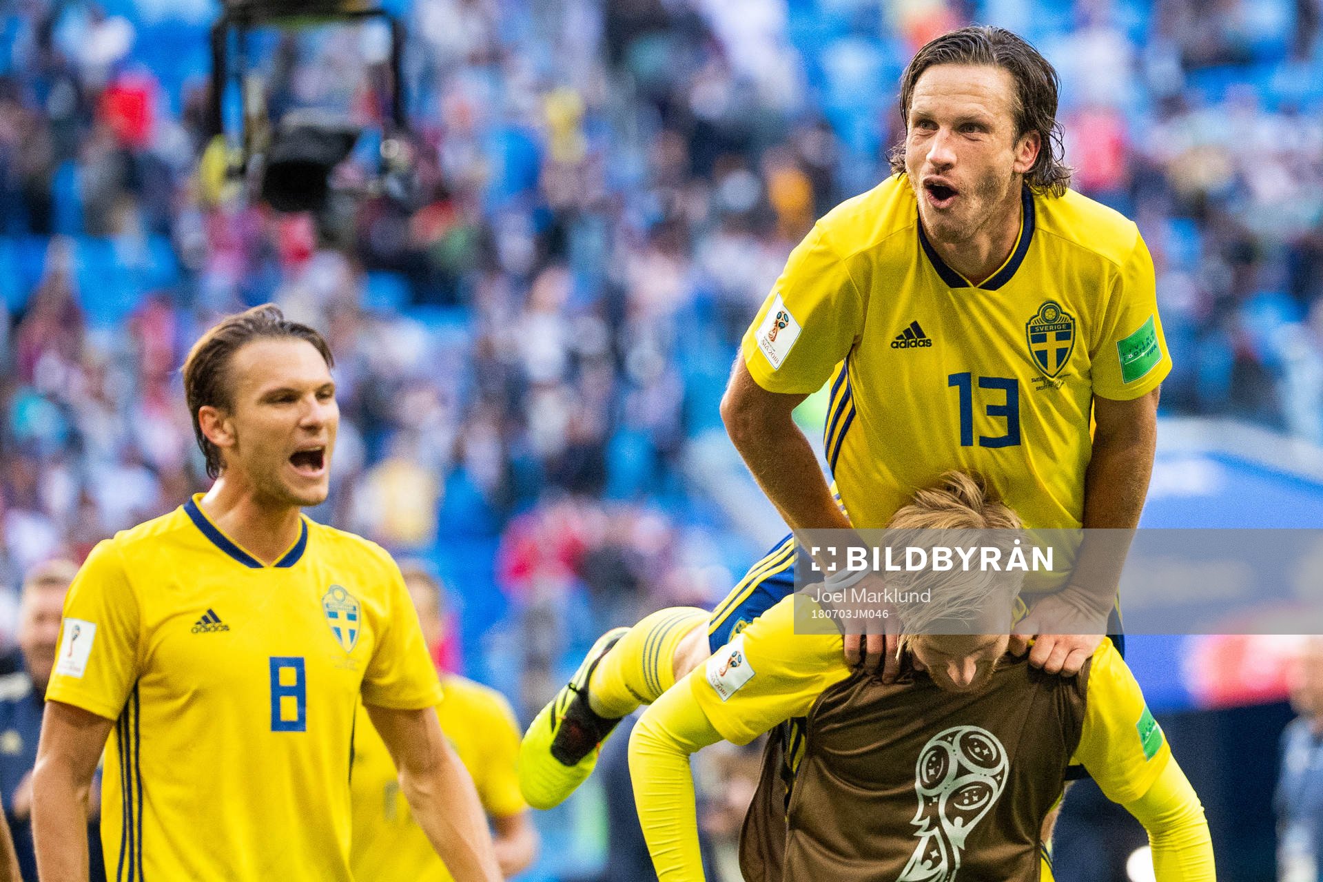 Gustav Svensson and Emil Forsberg of Sweden celebrate